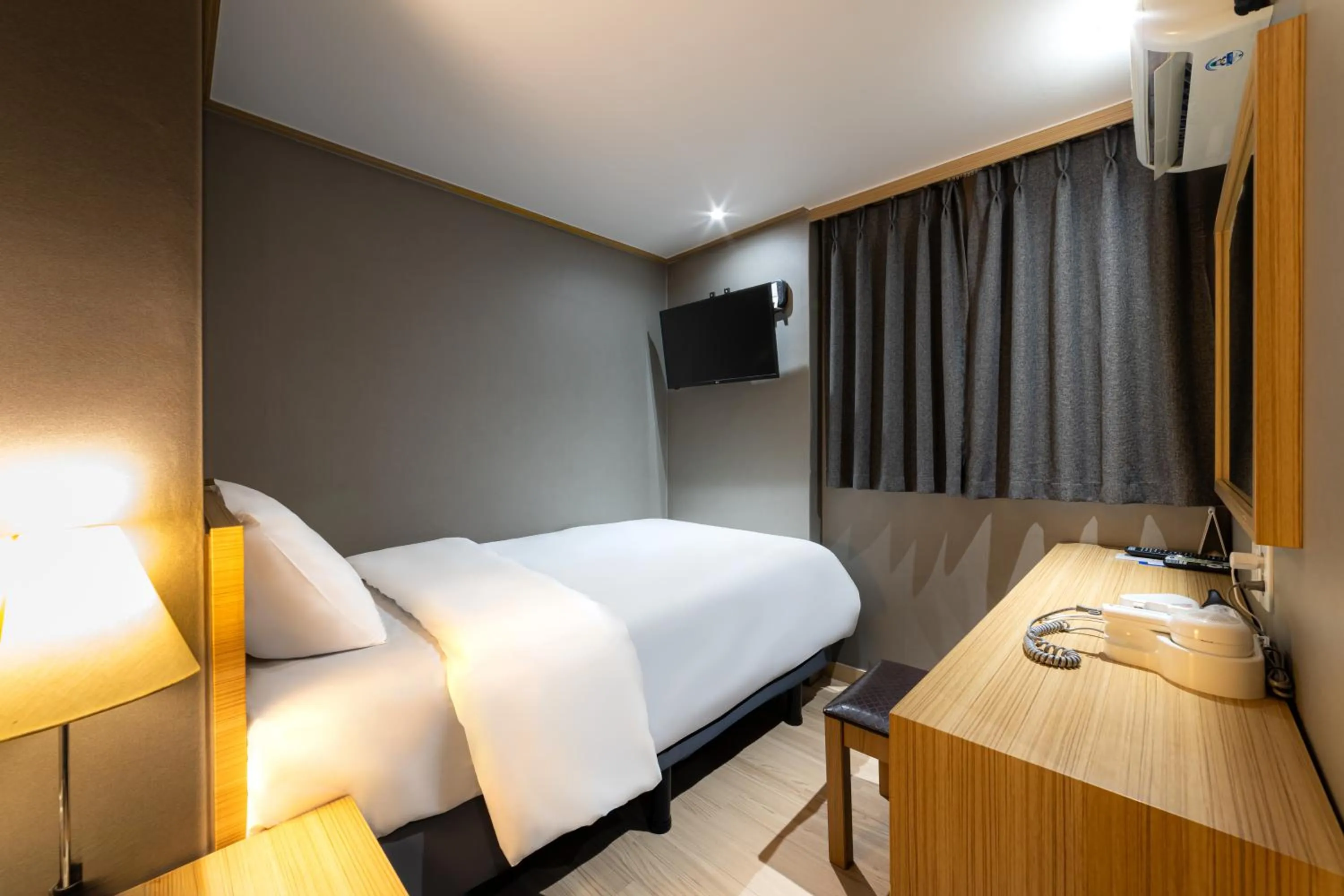 Bed in About Stay Seoul