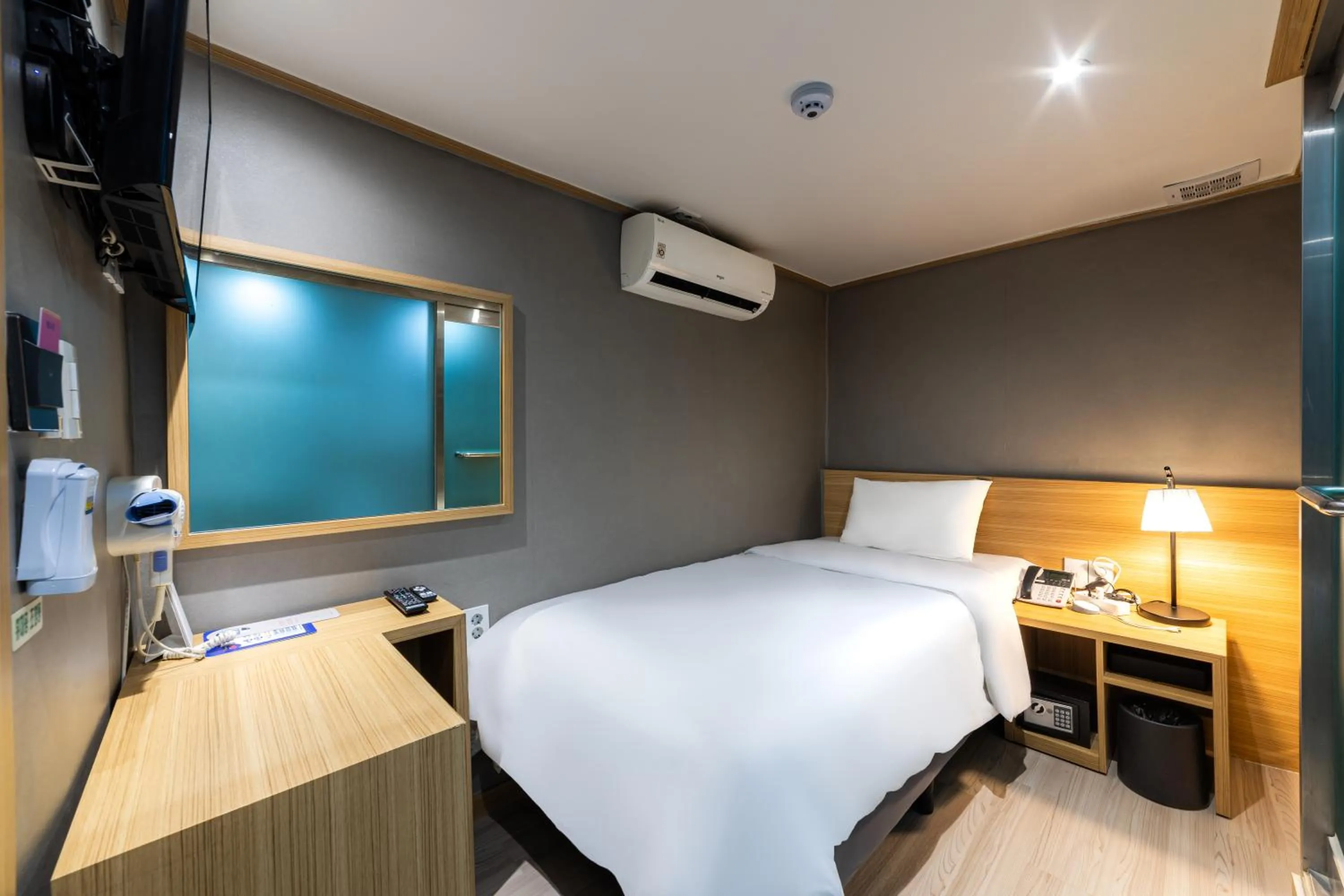 Bed in About Stay Seoul