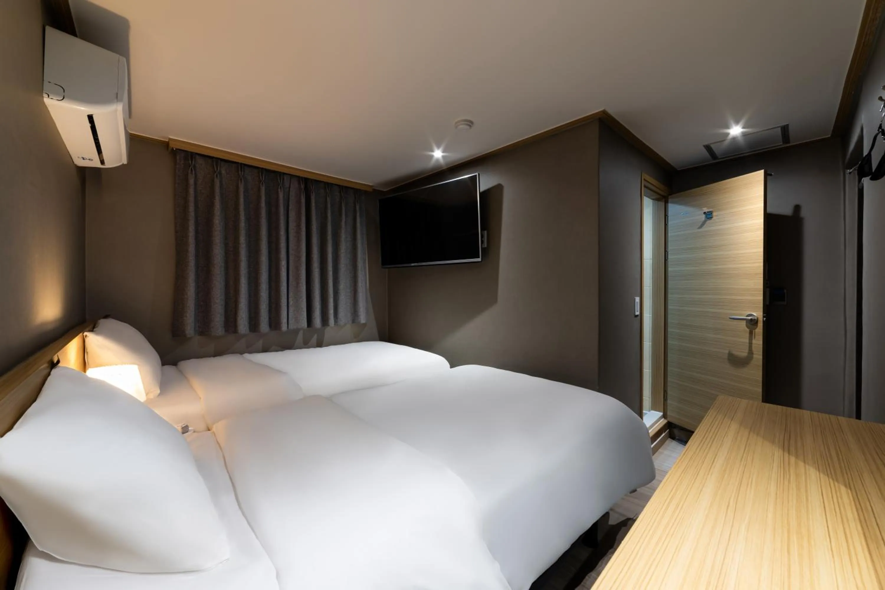 Bed in About Stay Seoul