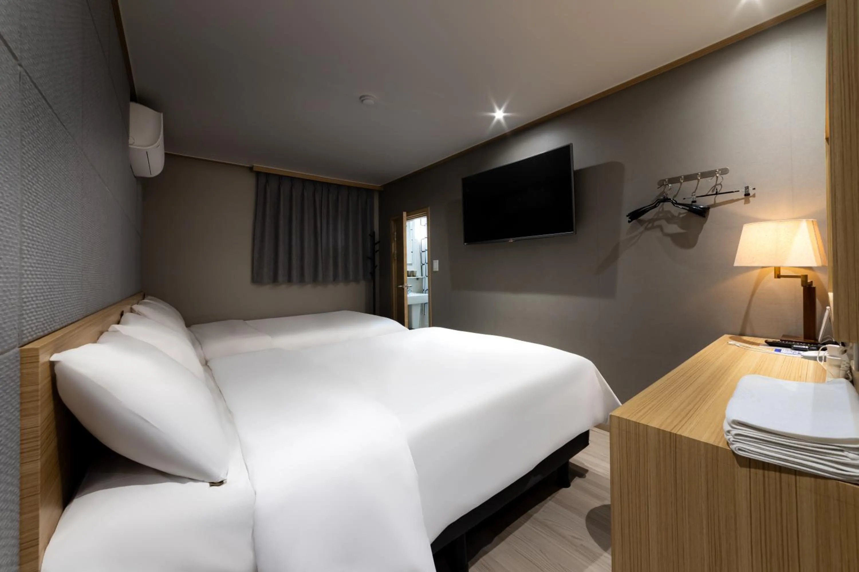 Bed in About Stay Seoul