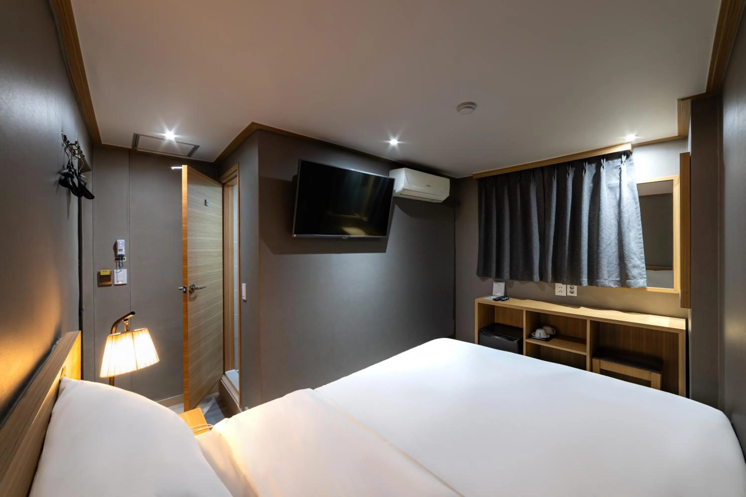 Bed in About Stay Seoul