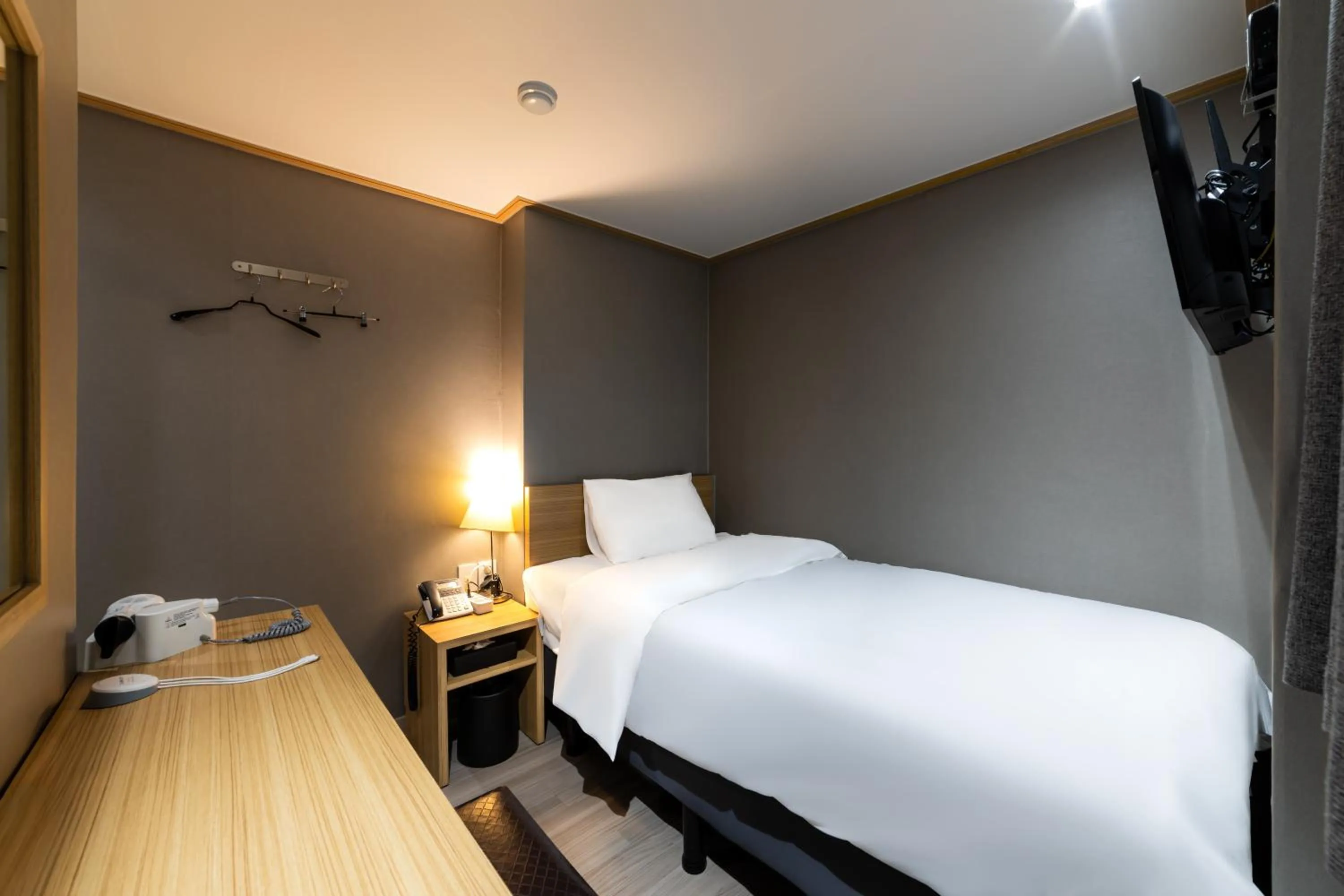 Bed in About Stay Seoul
