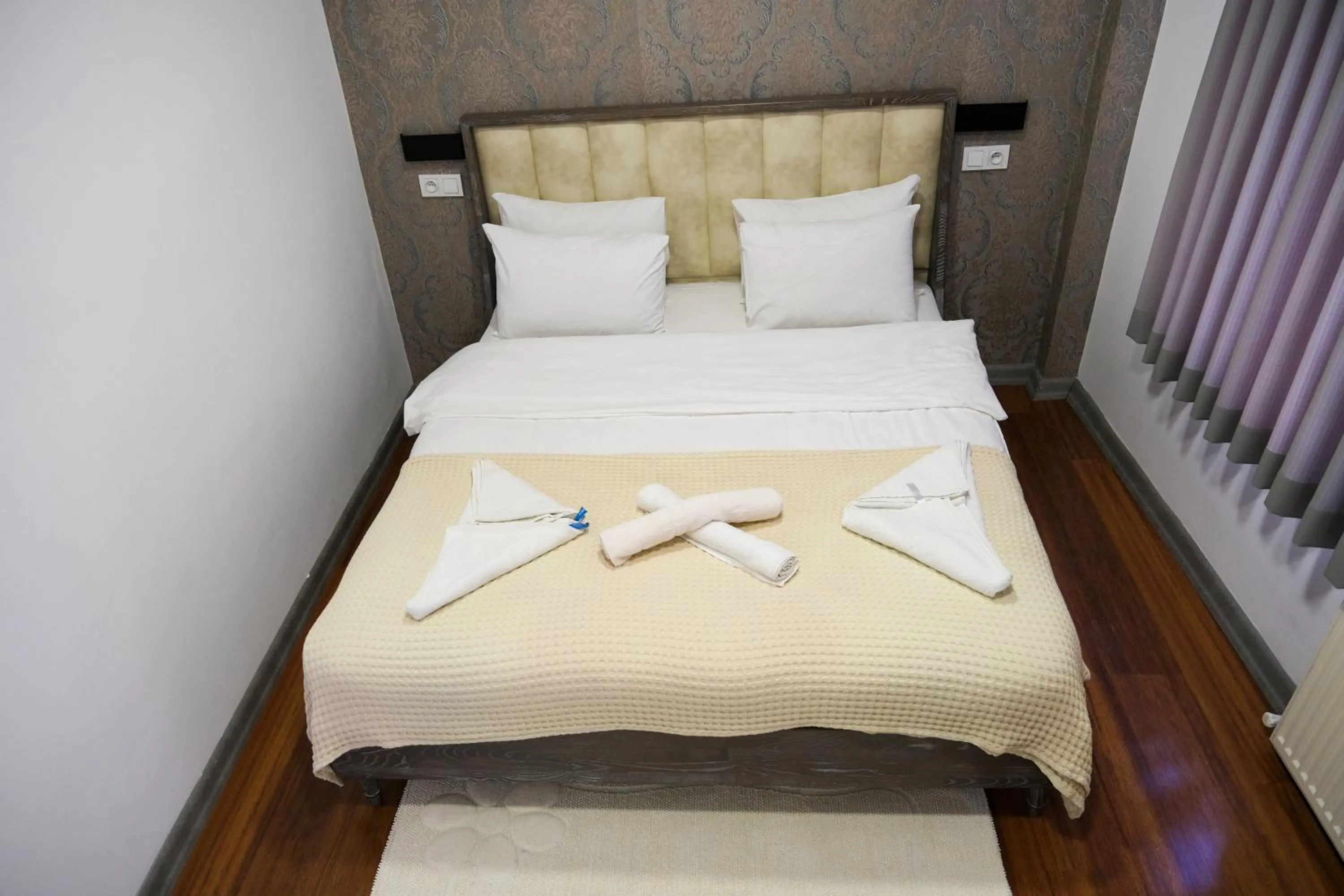 Bed in Taksim Neo Pera Suites