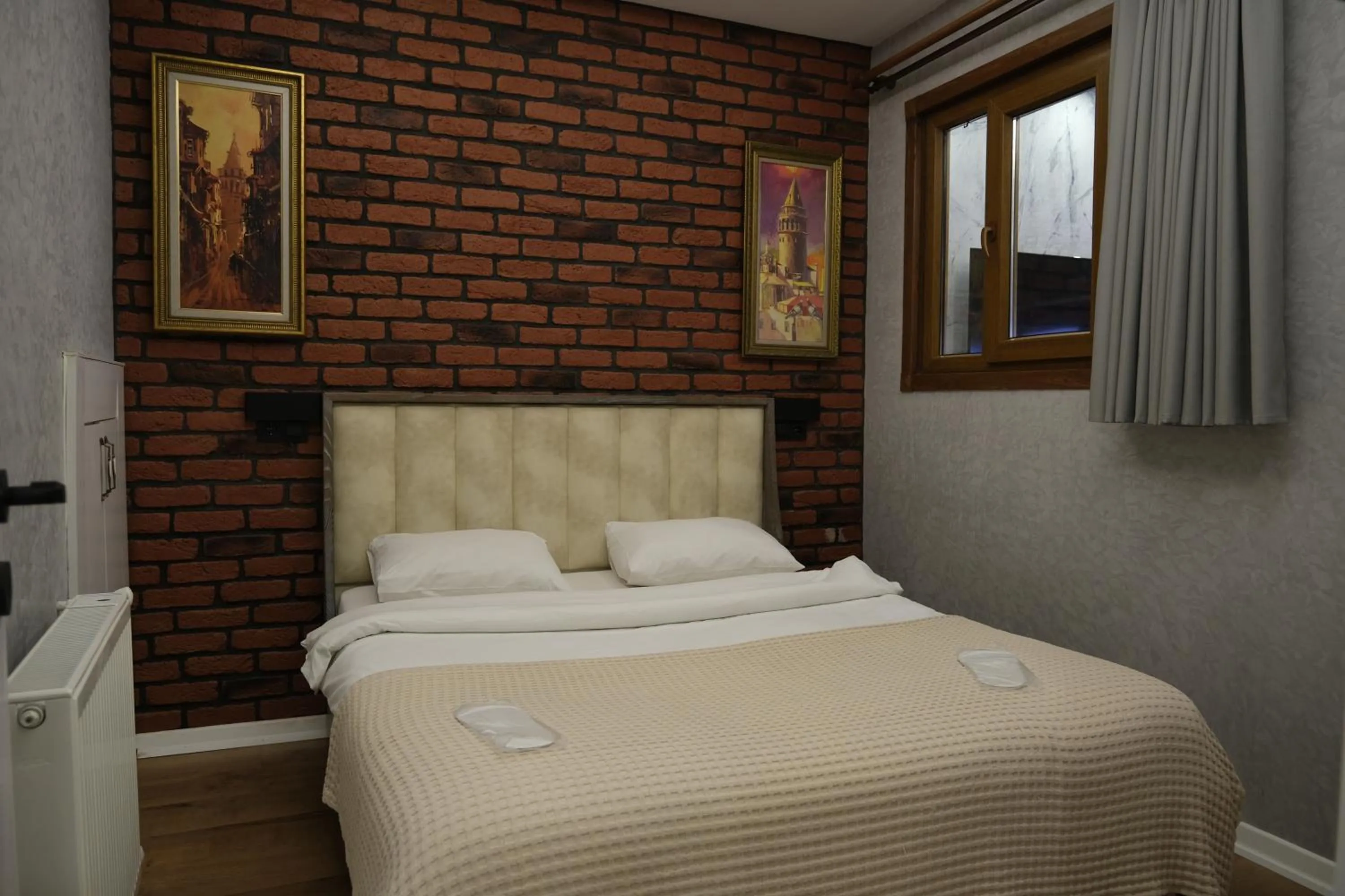 Bed in Taksim Neo Pera Suites