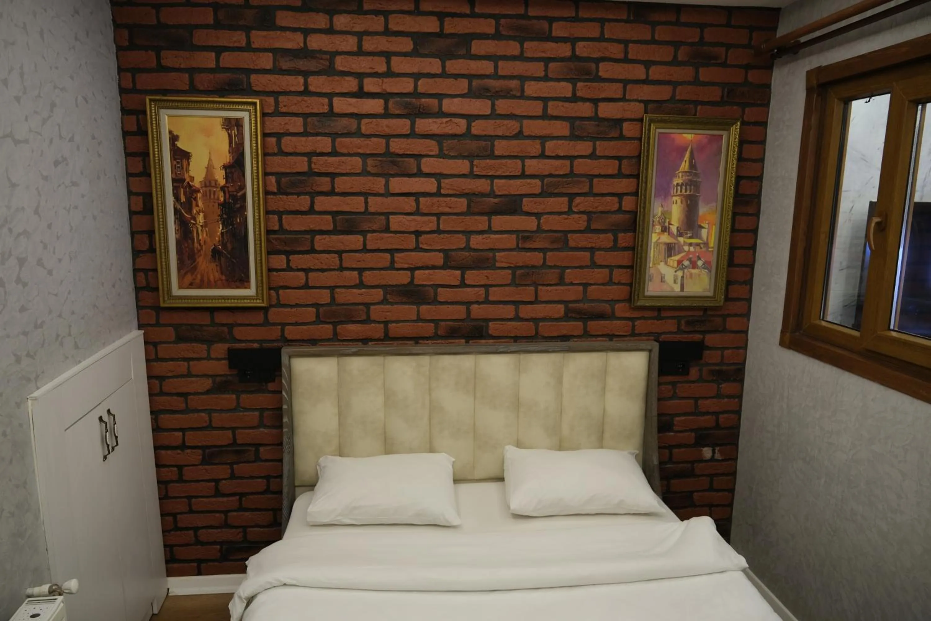 Bed in Taksim Neo Pera Suites