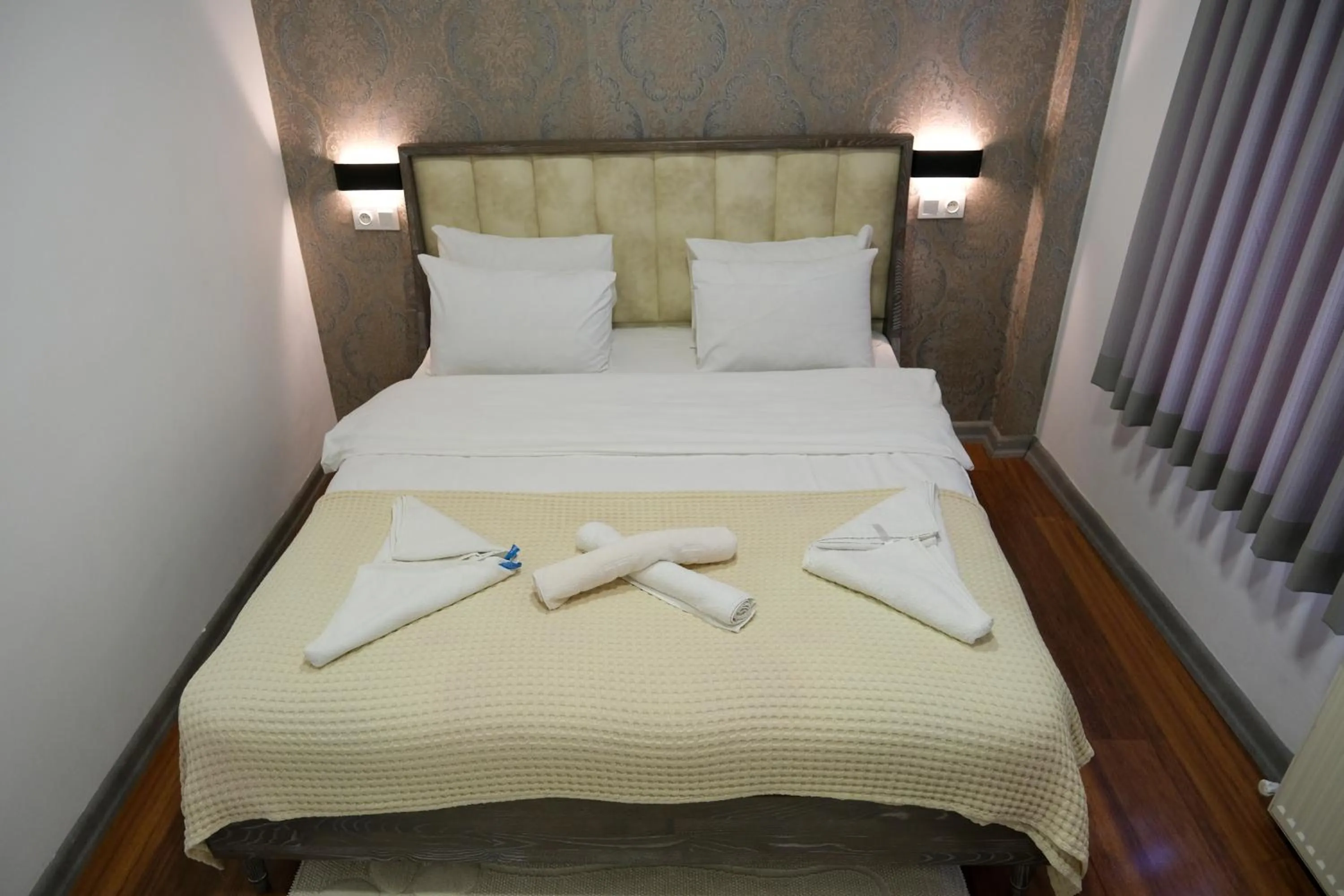 Bed in Taksim Neo Pera Suites
