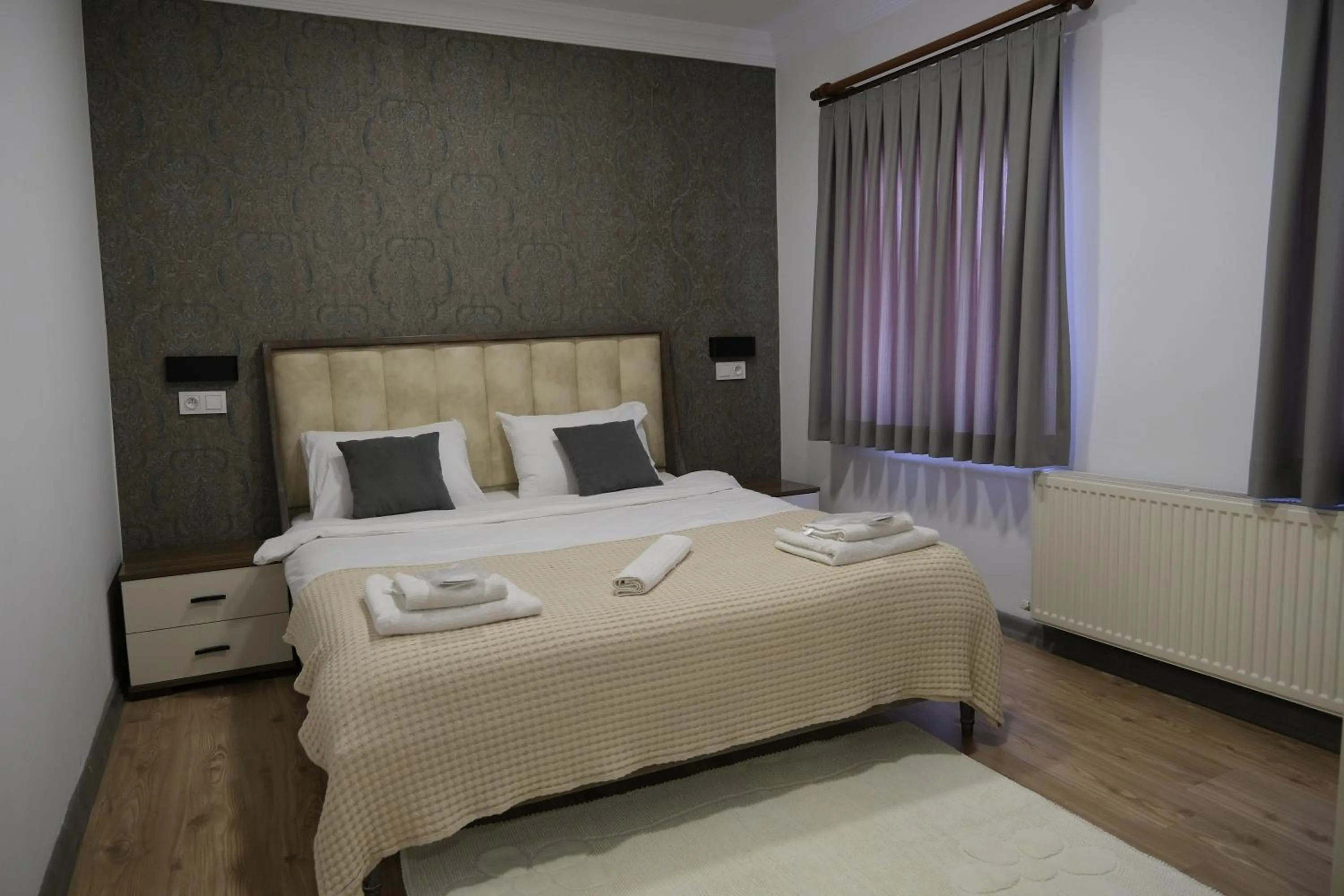 Bed in Taksim Neo Pera Suites