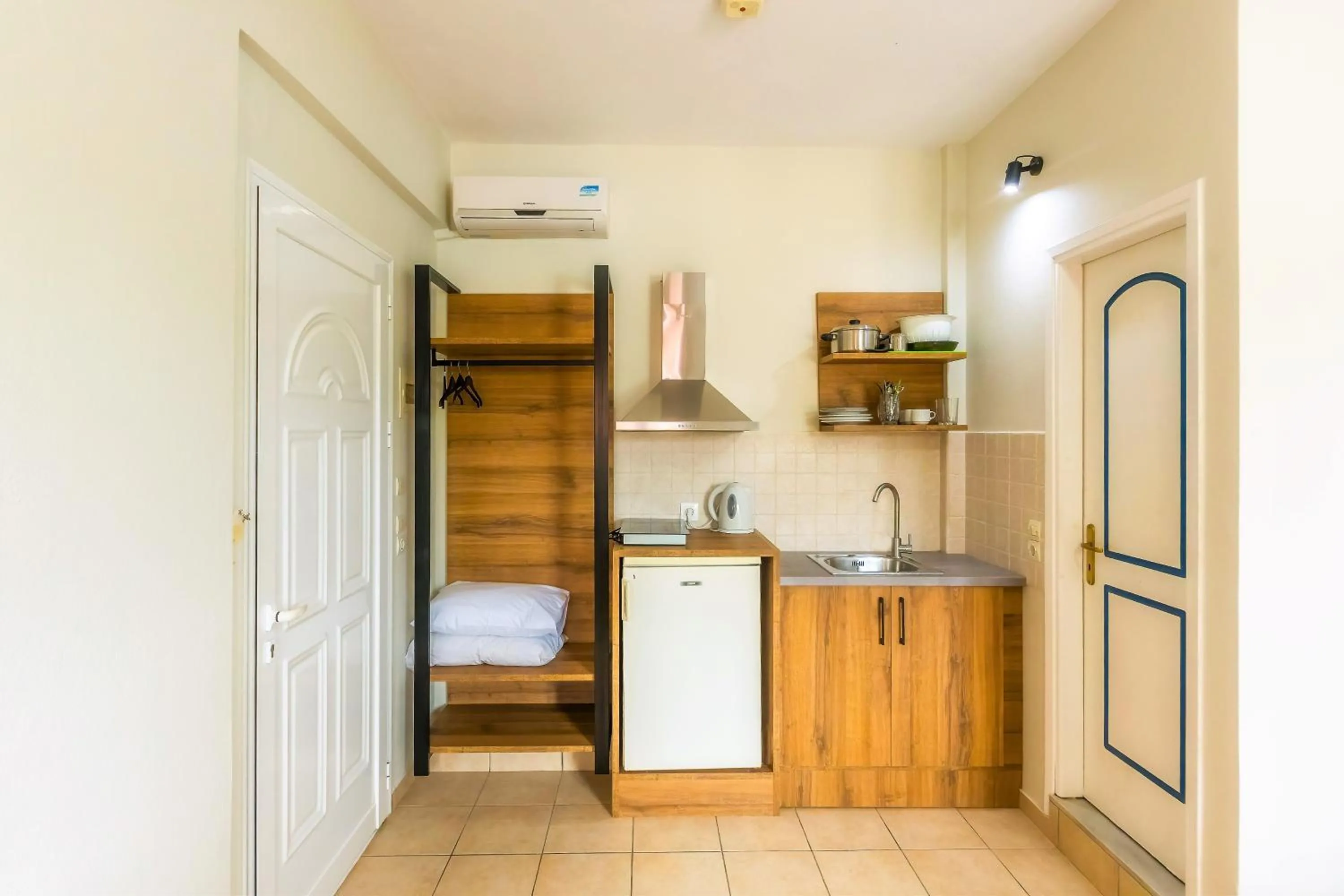Kitchen or kitchenette in Nikos Villas