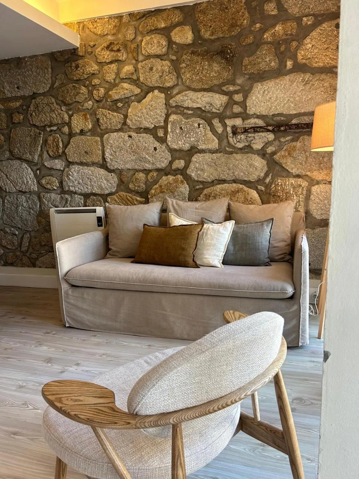 Seating area in Largo São Domingos by Innapartments