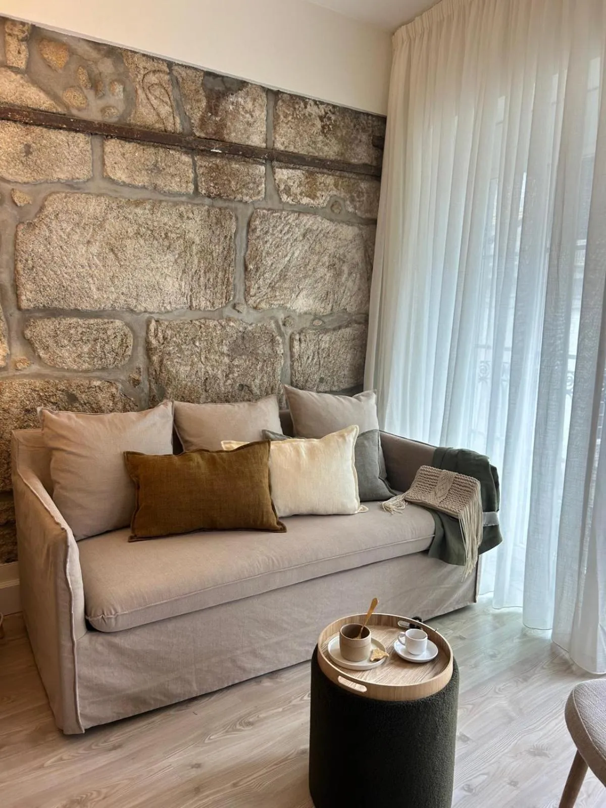 Living room in Largo São Domingos by Innapartments