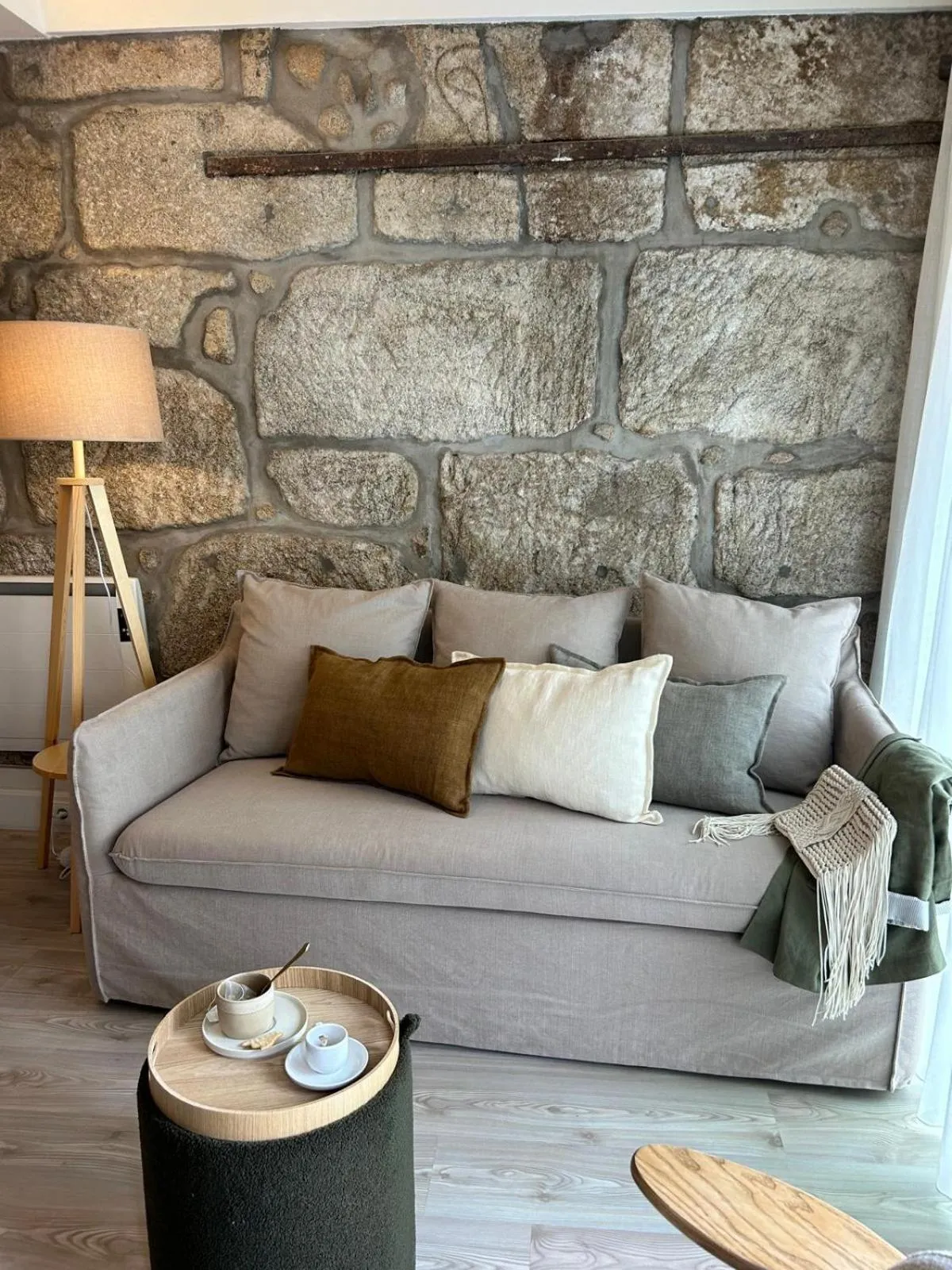 Living room in Largo São Domingos by Innapartments