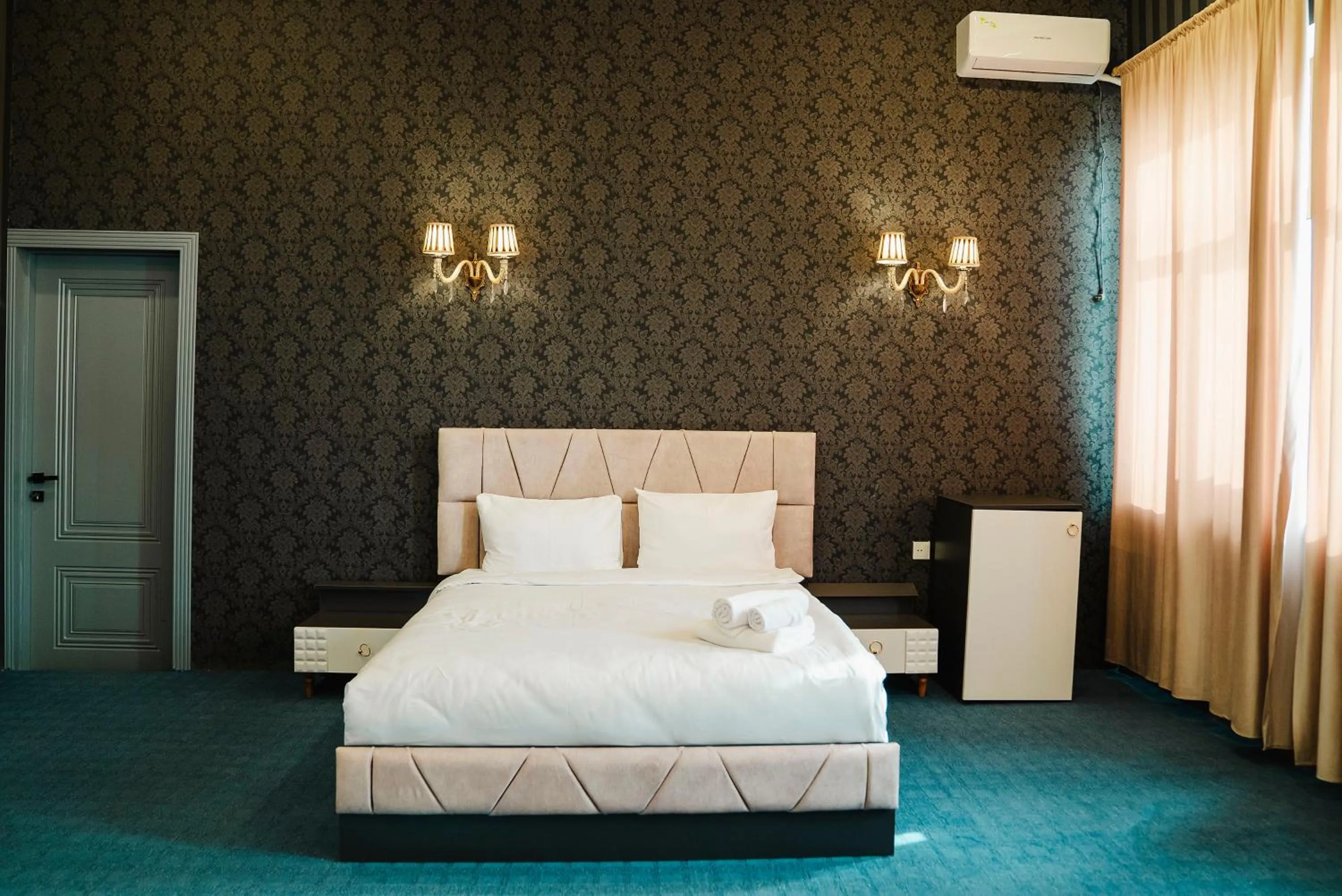 Bed in Olive Garden Baku Hotel