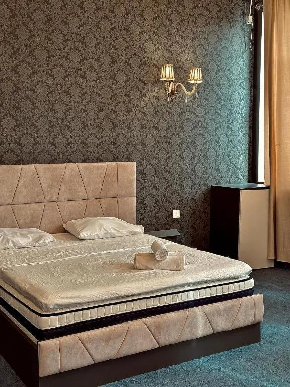 Bed in Olive Garden Baku Hotel