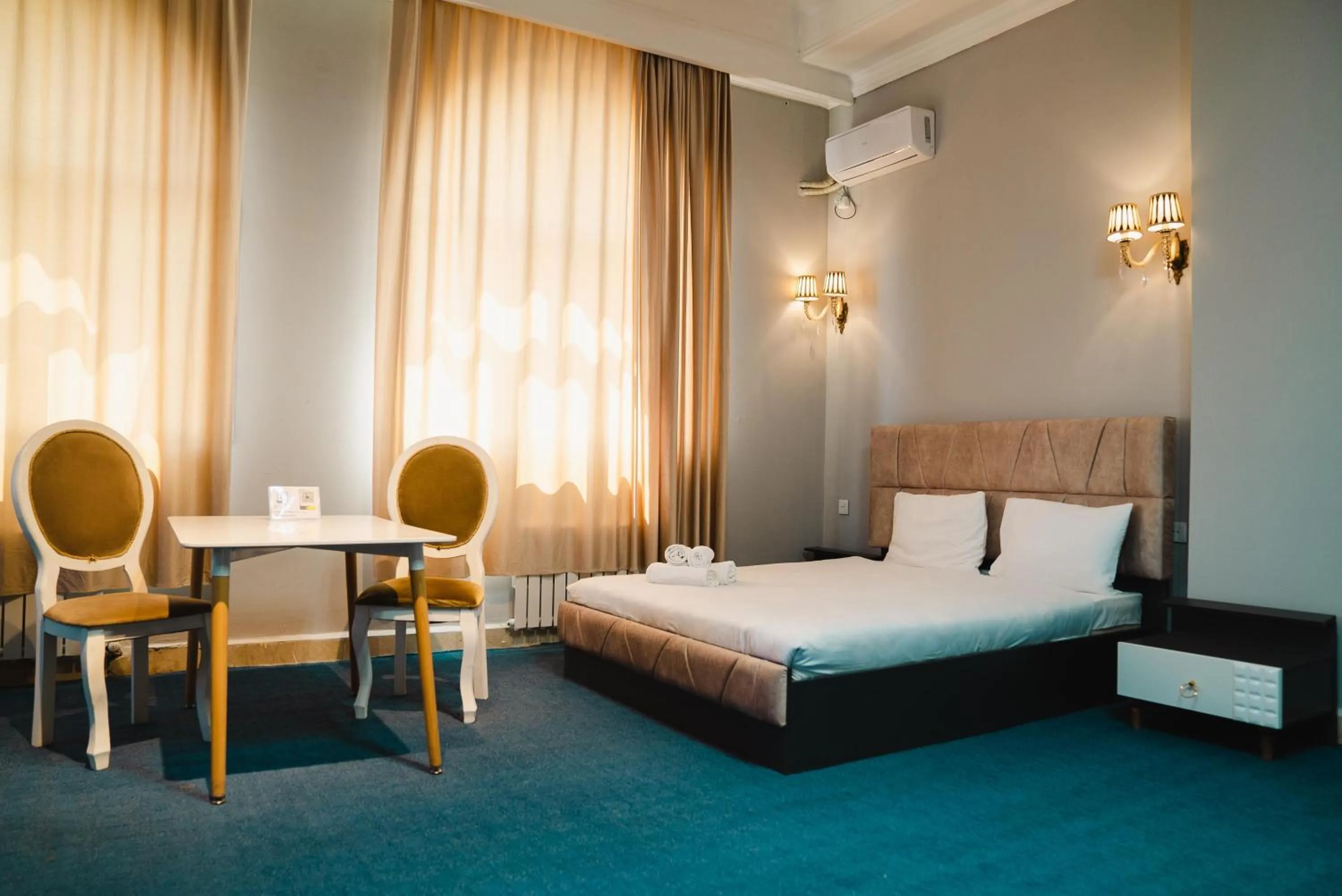 Bed in Olive Garden Baku Hotel