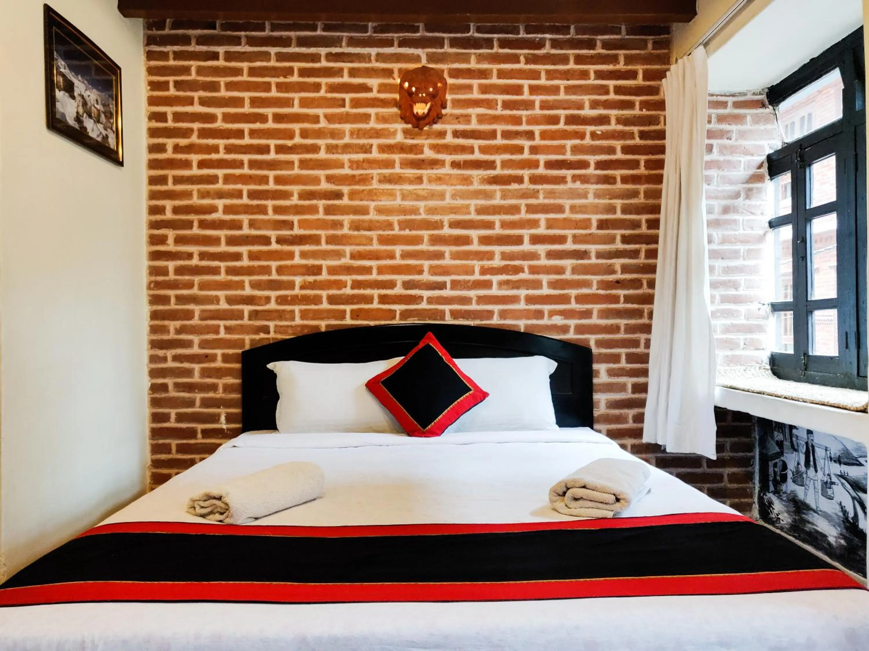 Bed in Tulaja Boutique Hotel