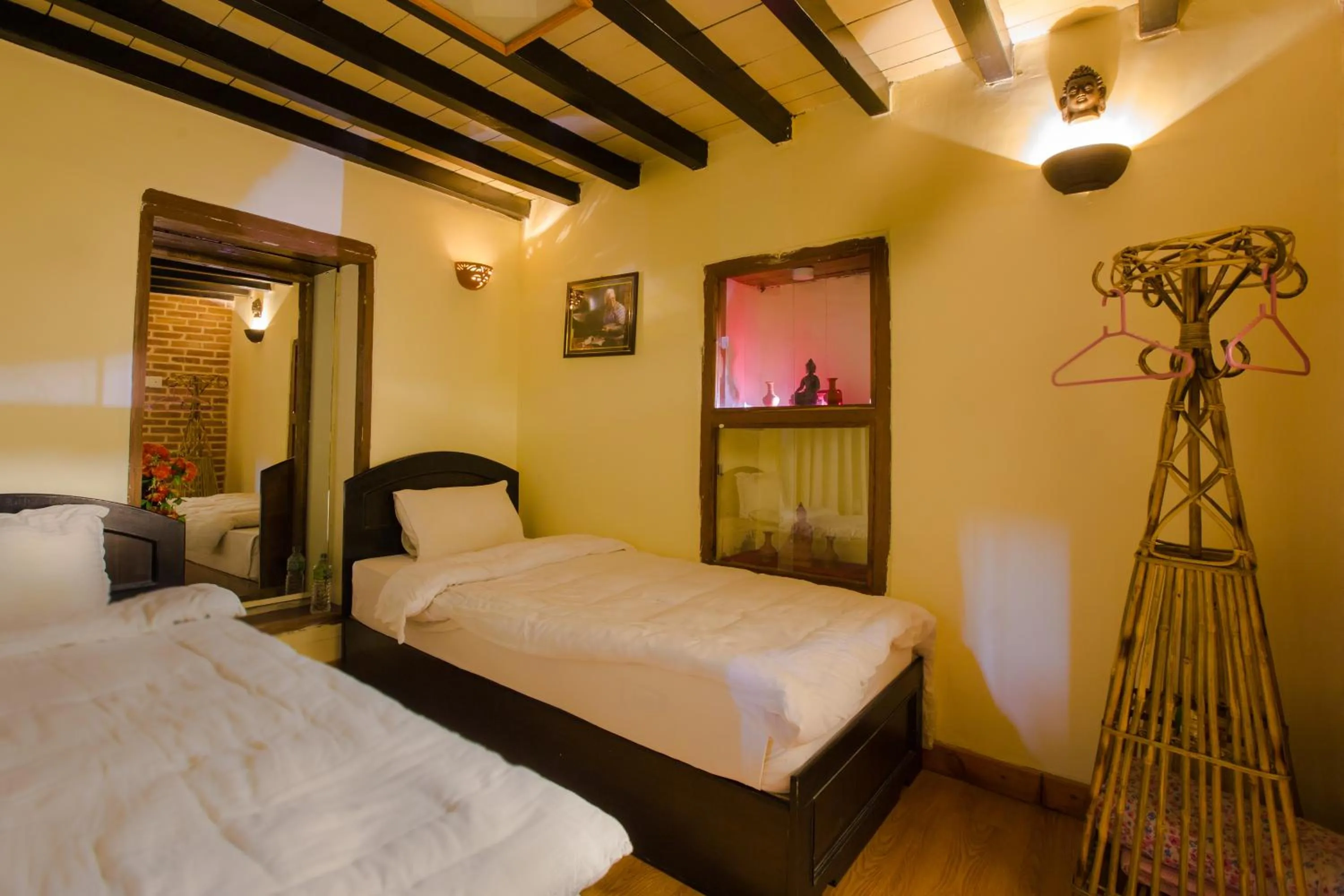 Bed in Tulaja Boutique Hotel