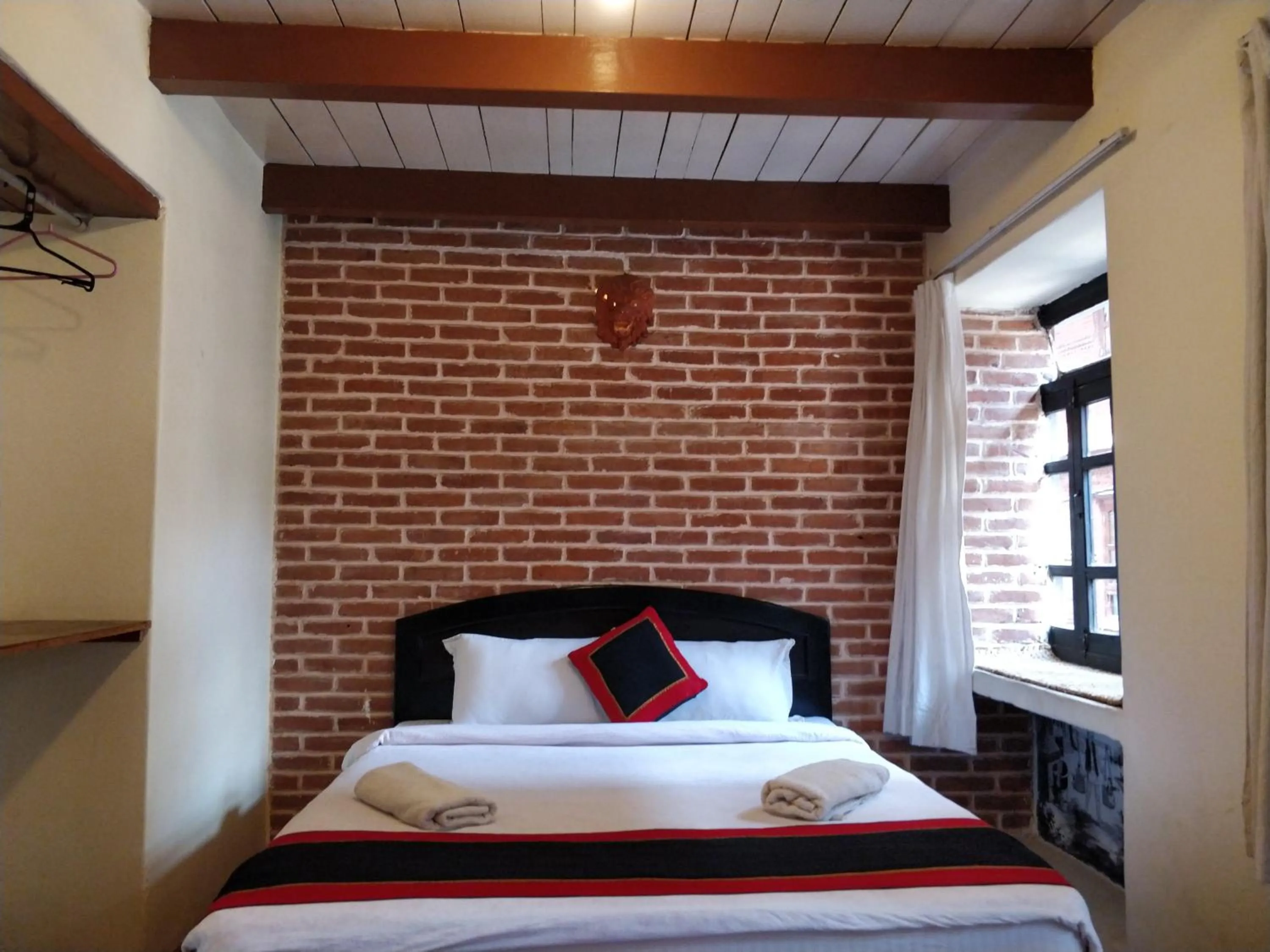 Bed in Tulaja Boutique Hotel