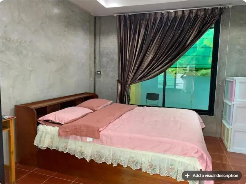 Bed in Baan Khun Ya Sukhothai Old City