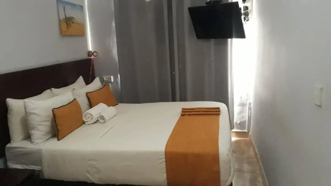 Bed in Plateau Guest House