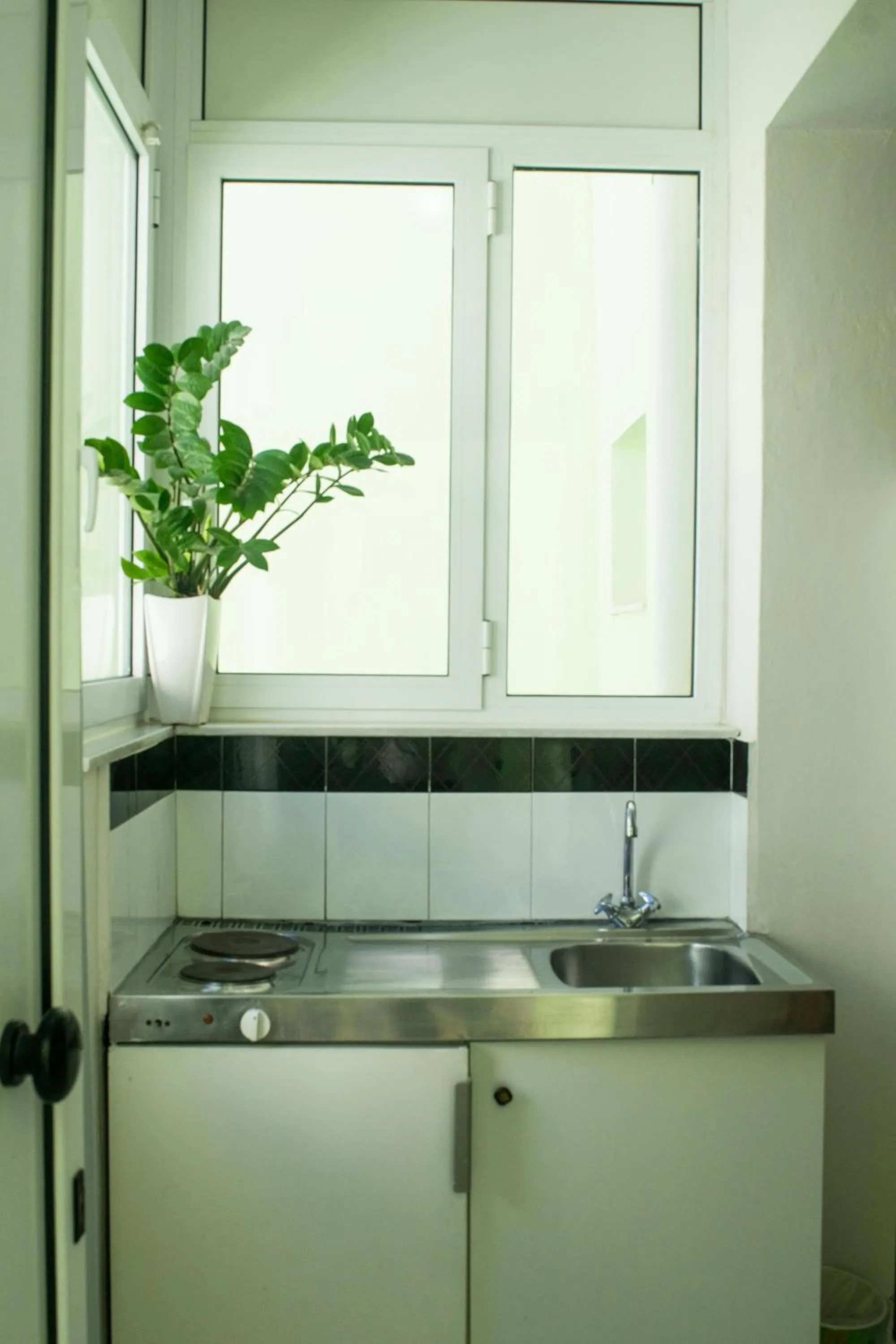 Kitchen or kitchenette in Greta Apartments