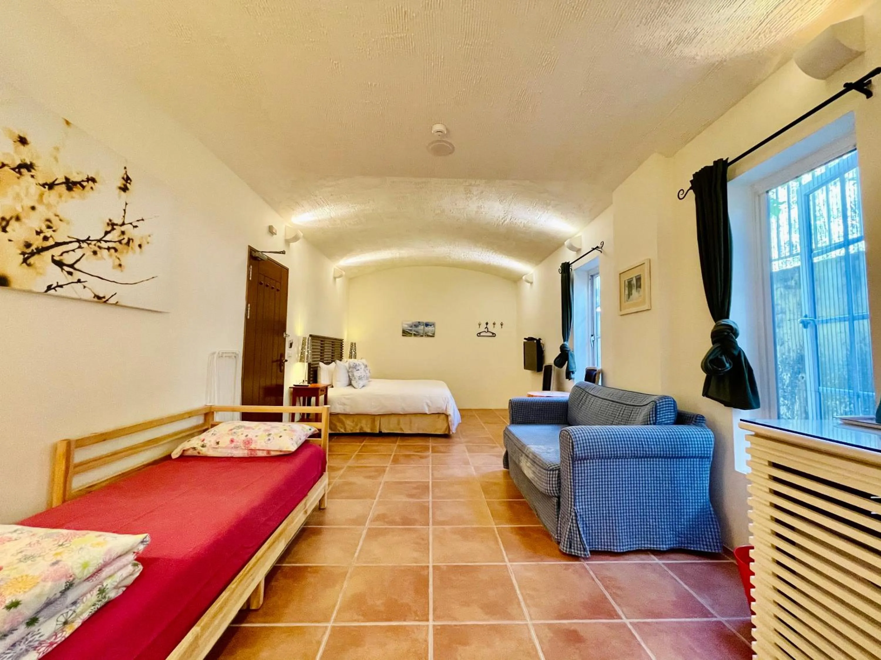 Photo of the whole room, Bed in SpoonDrift Hostal Kenting