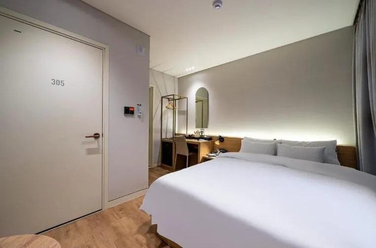 Bed in Lagobaum Hotel