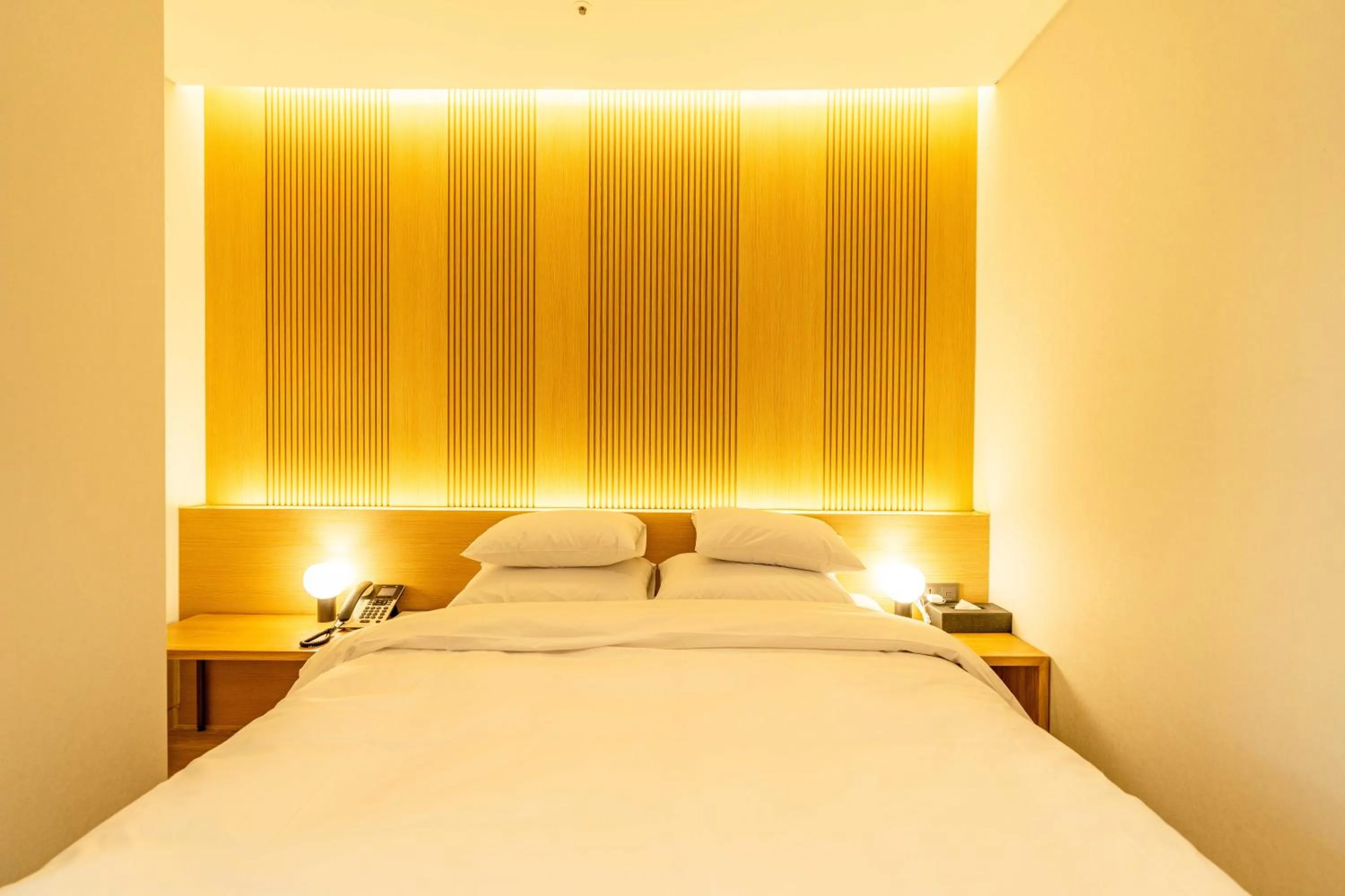 Bed in Lagobaum Hotel