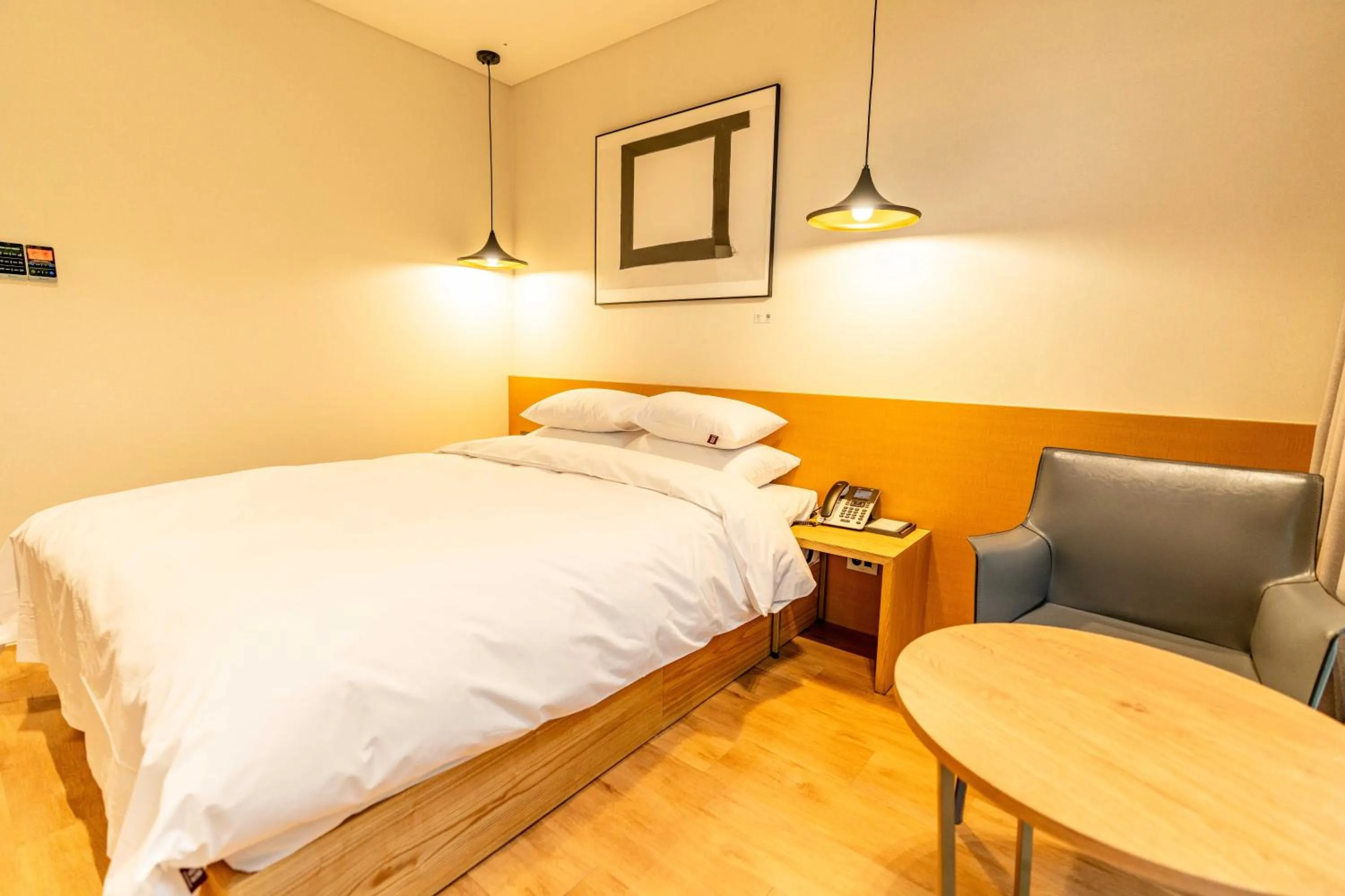 Bed in Lagobaum Hotel