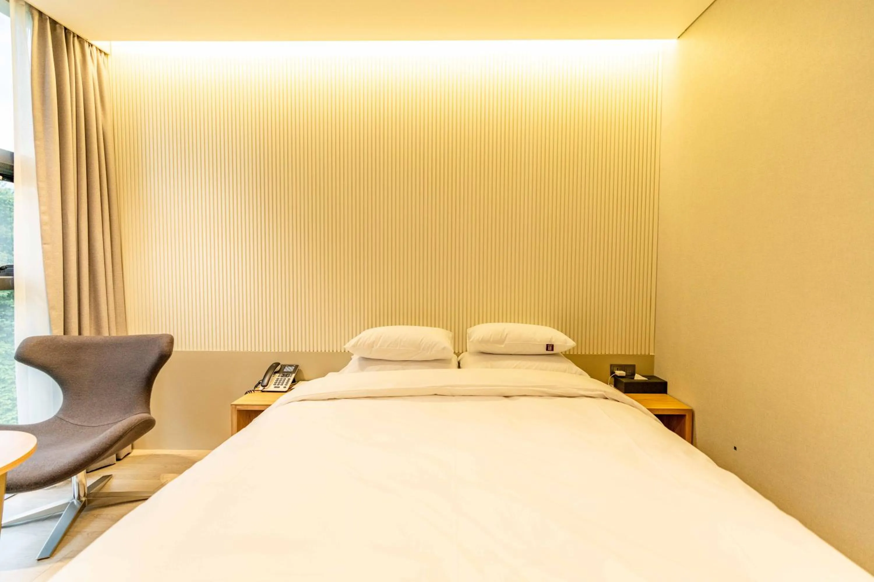 Bed in Lagobaum Hotel