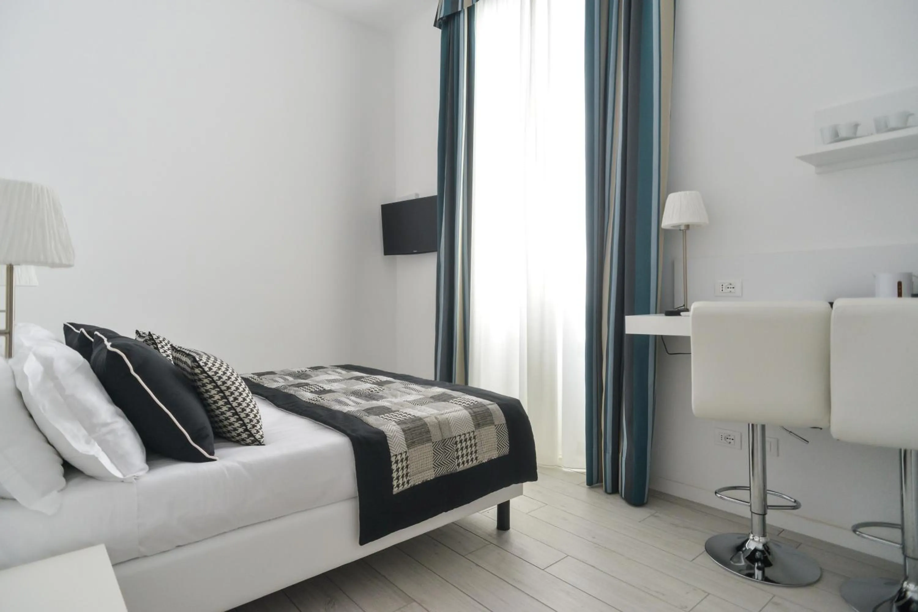 Bed in Lata Luxury Rooms