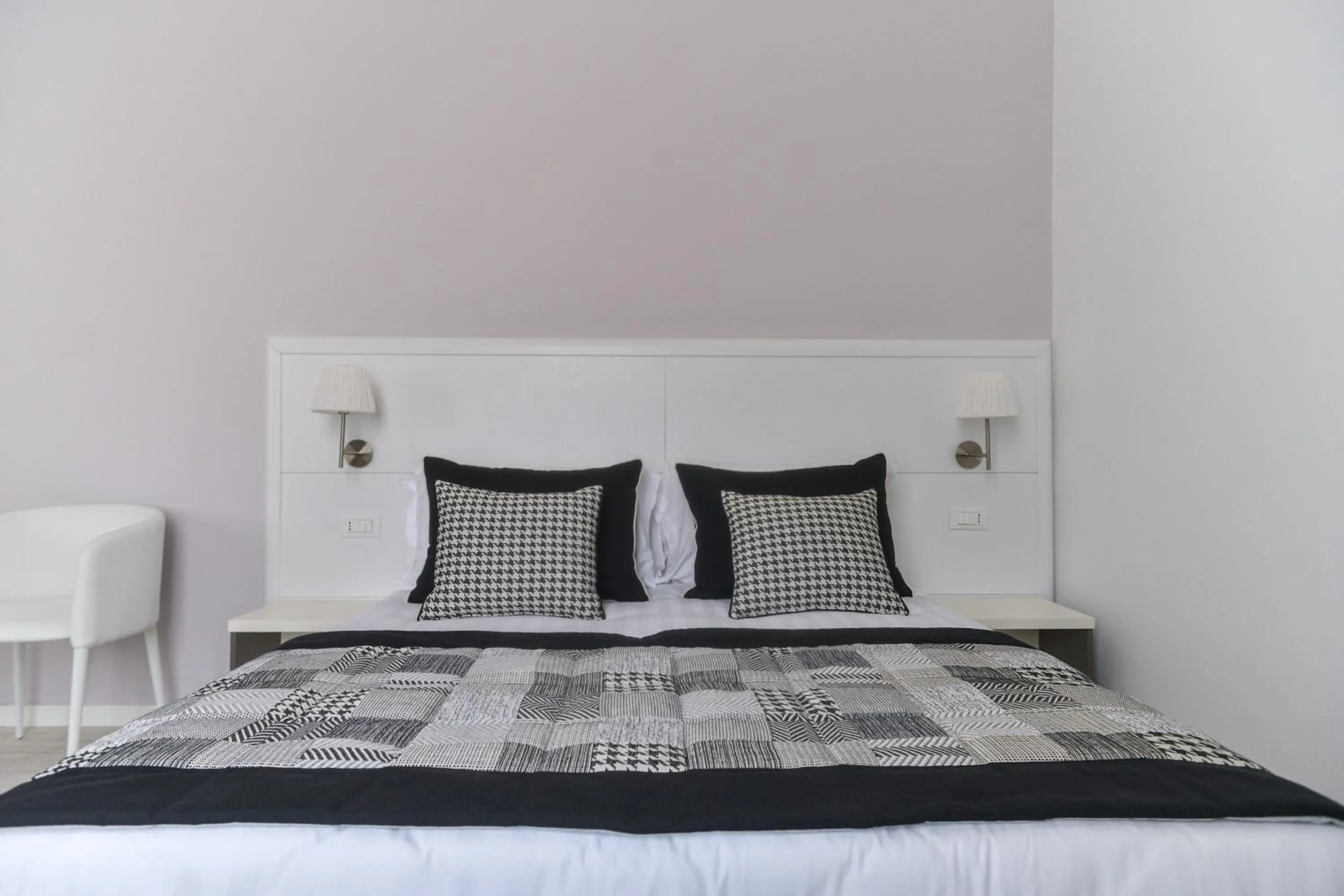 Bed in Lata Luxury Rooms