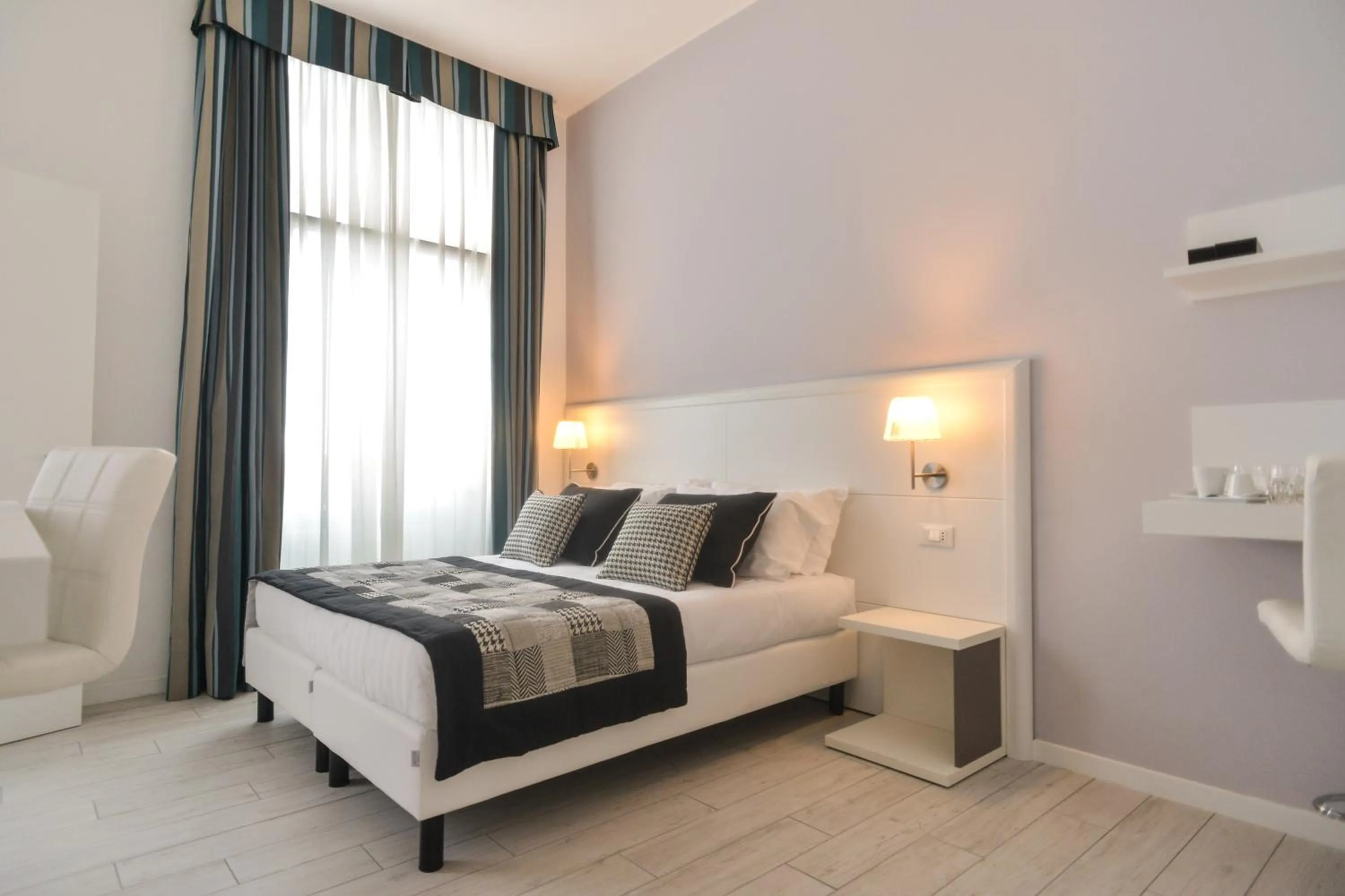 Bed in Lata Luxury Rooms