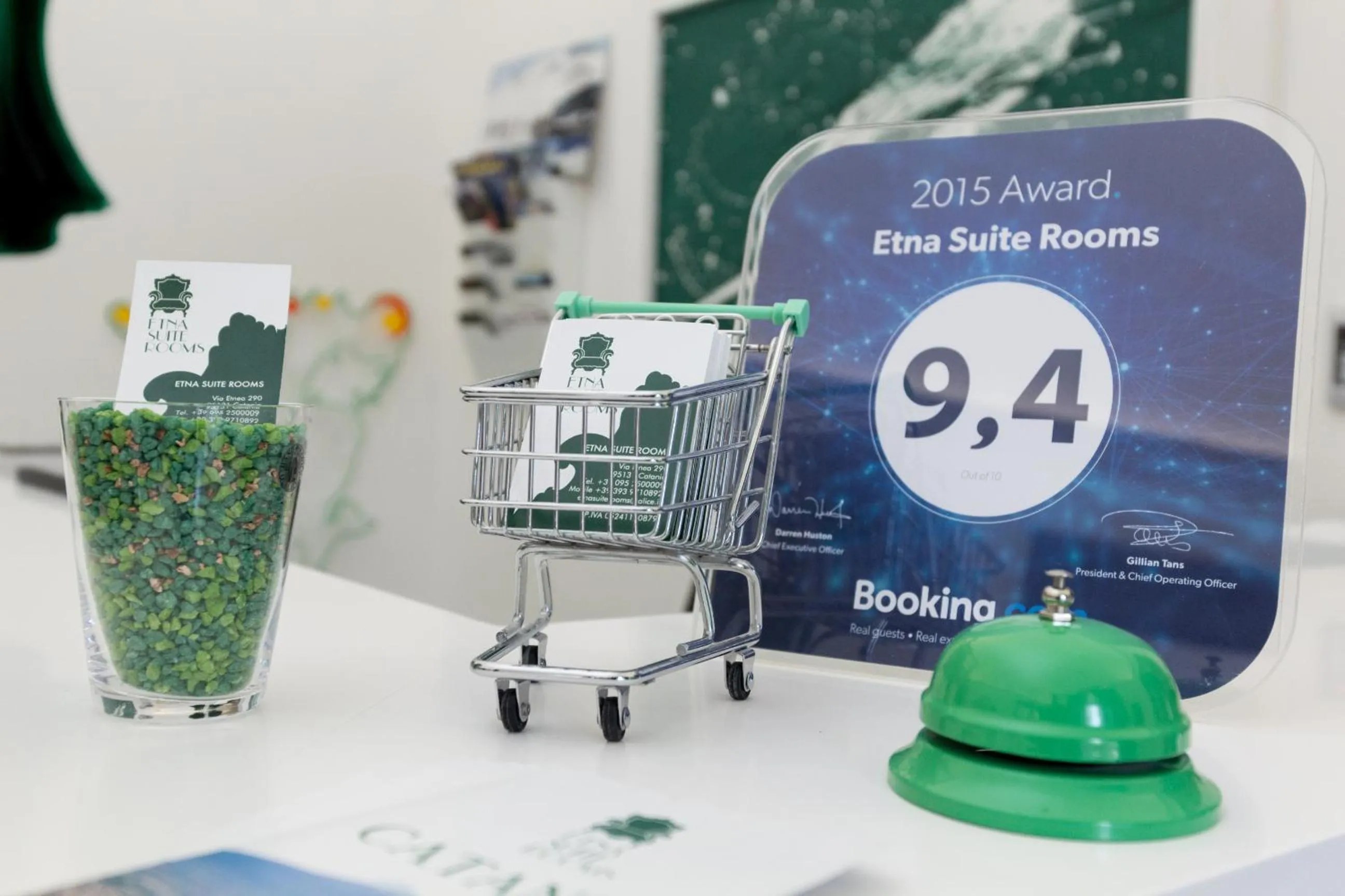 Property logo or sign in Etna Suite Group