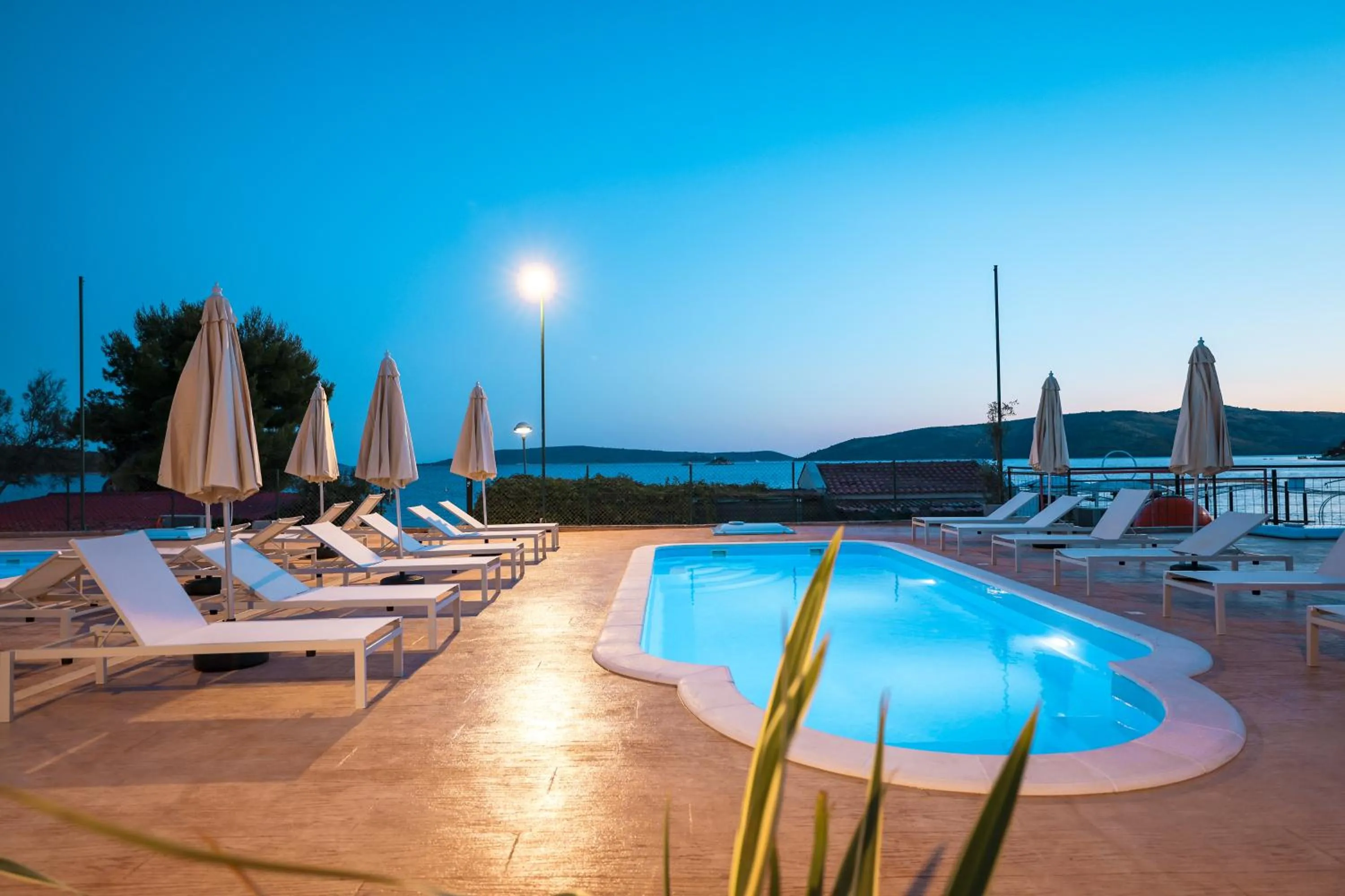 Pool view in Apartments Medena