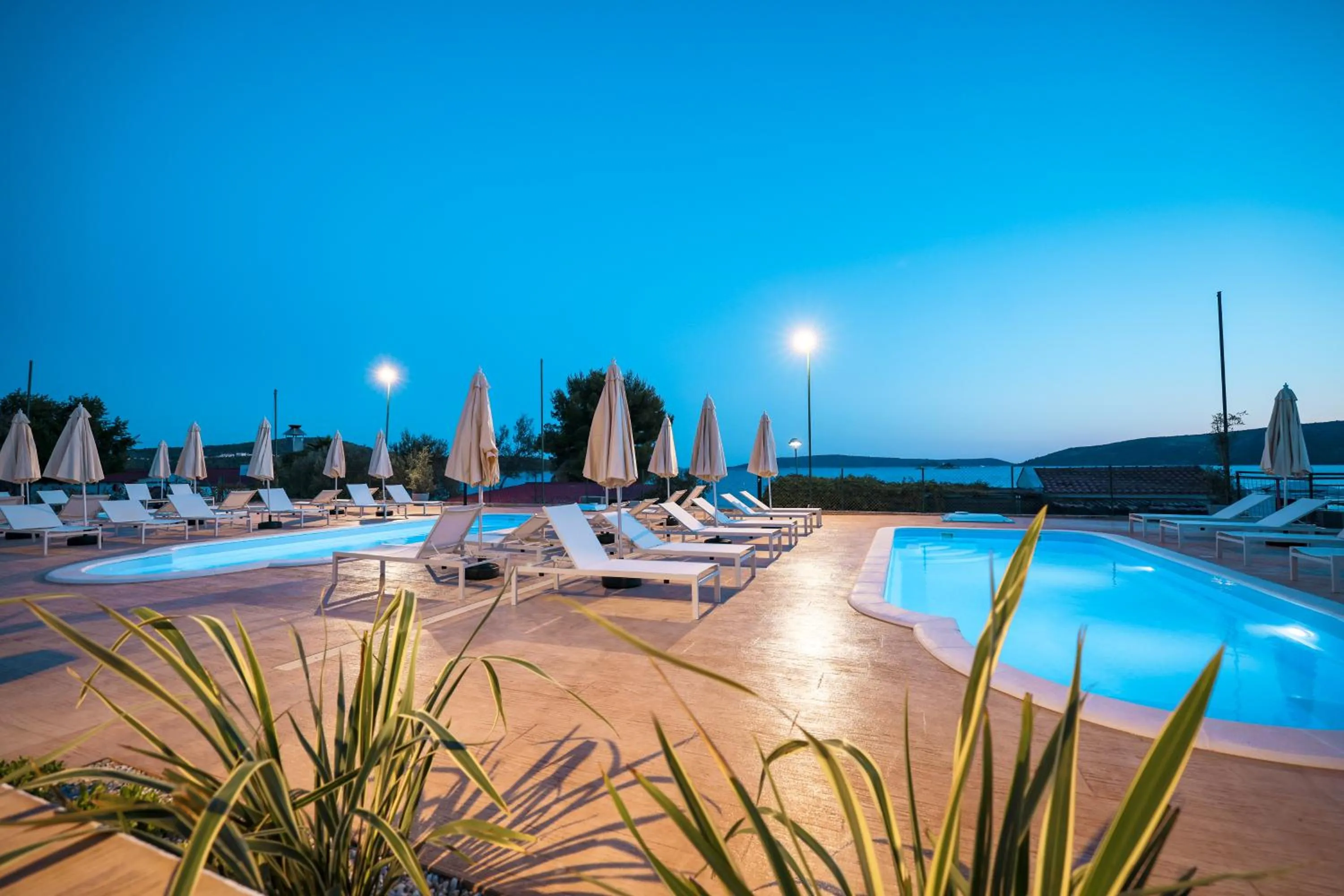 Pool view in Apartments Medena