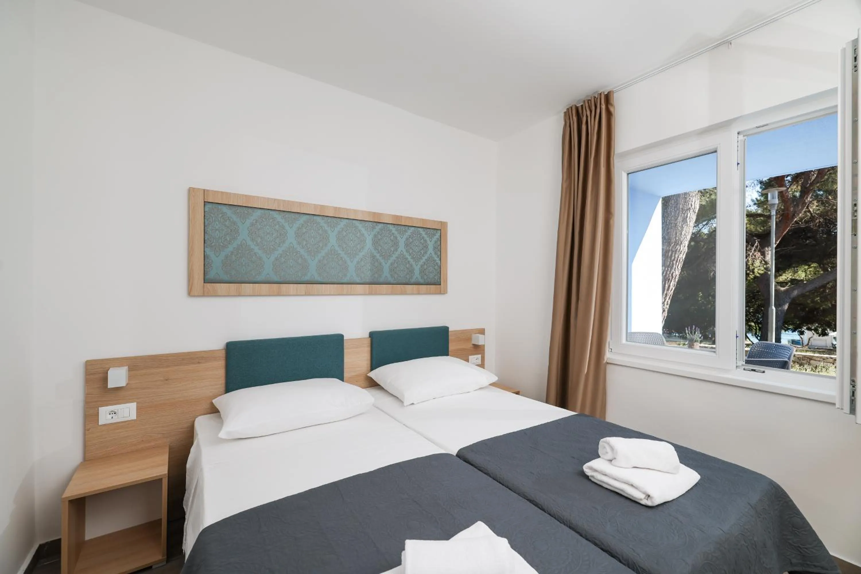 Bed in Apartments Medena