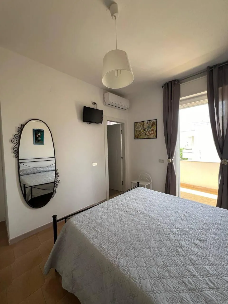 Bedroom in Le Grotte B&B