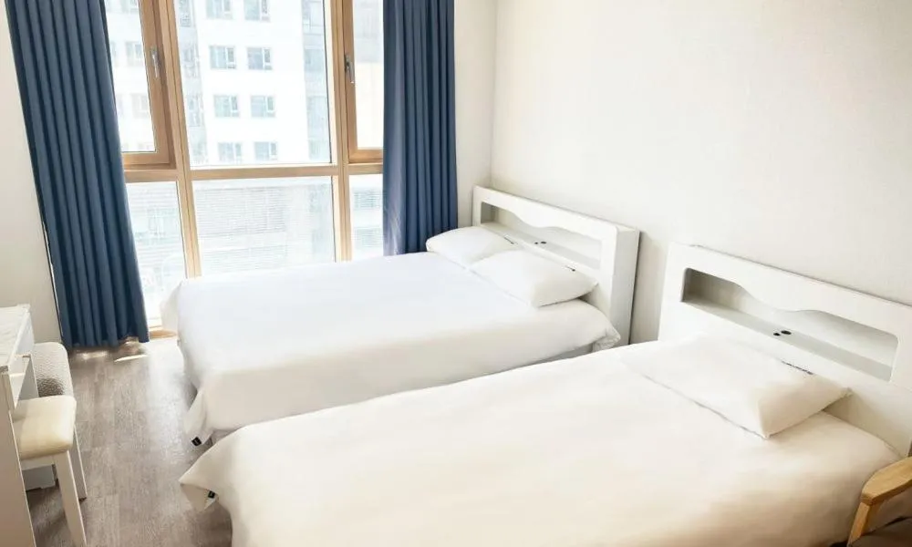 Bed in Centum City Hotel