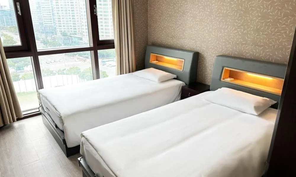 Bed in Centum City Hotel