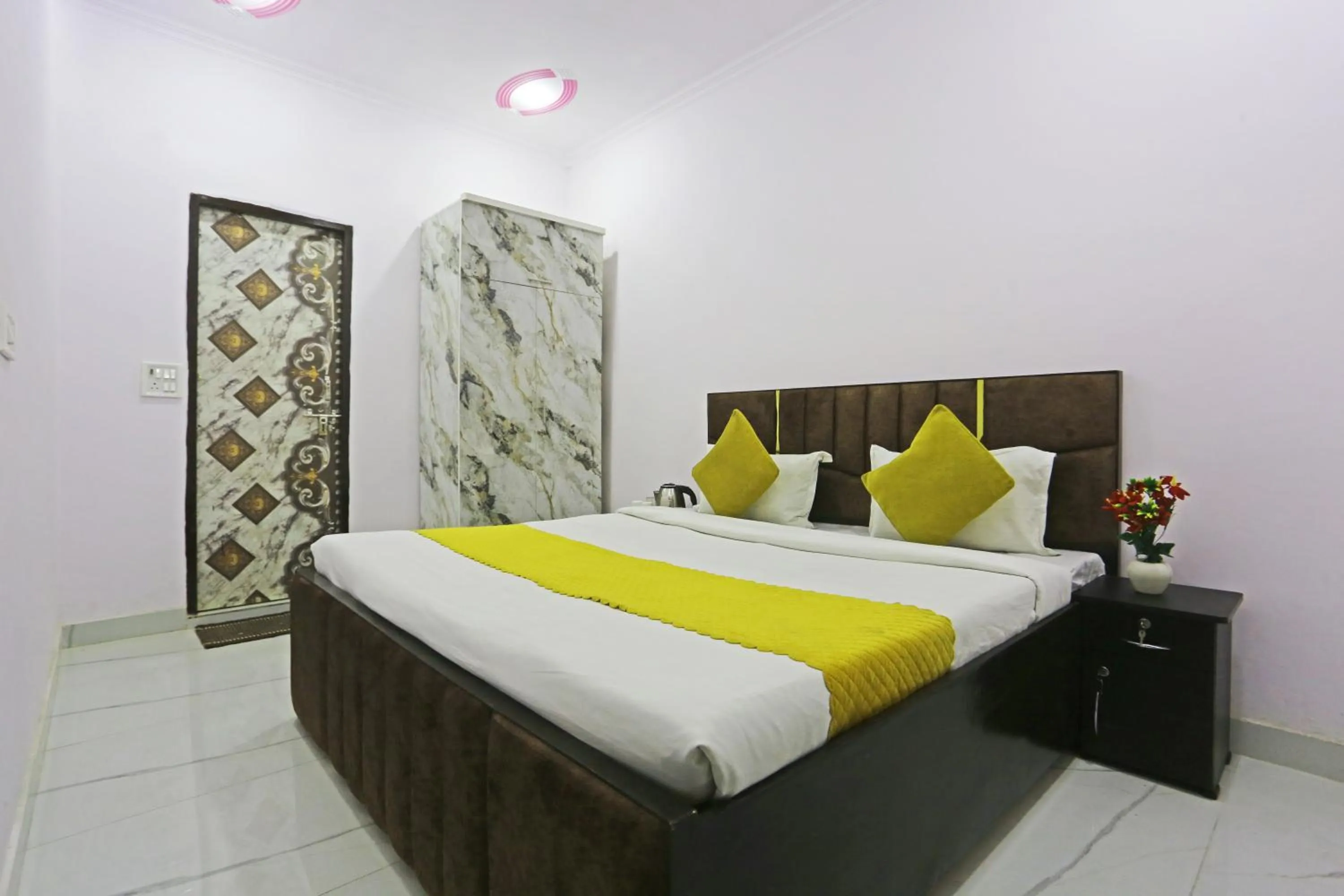 Bed in Twamev Residency