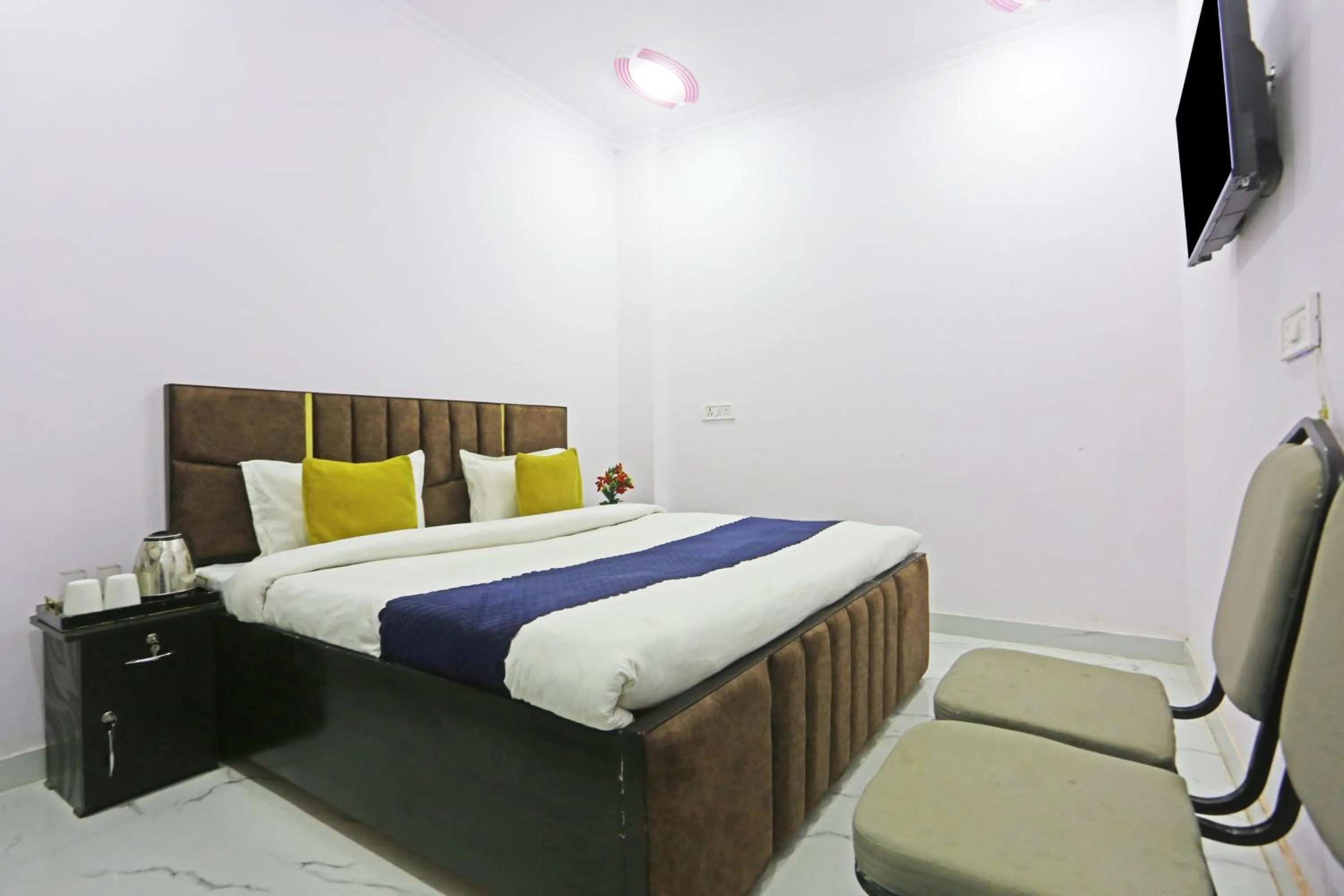 Bed in Twamev Residency