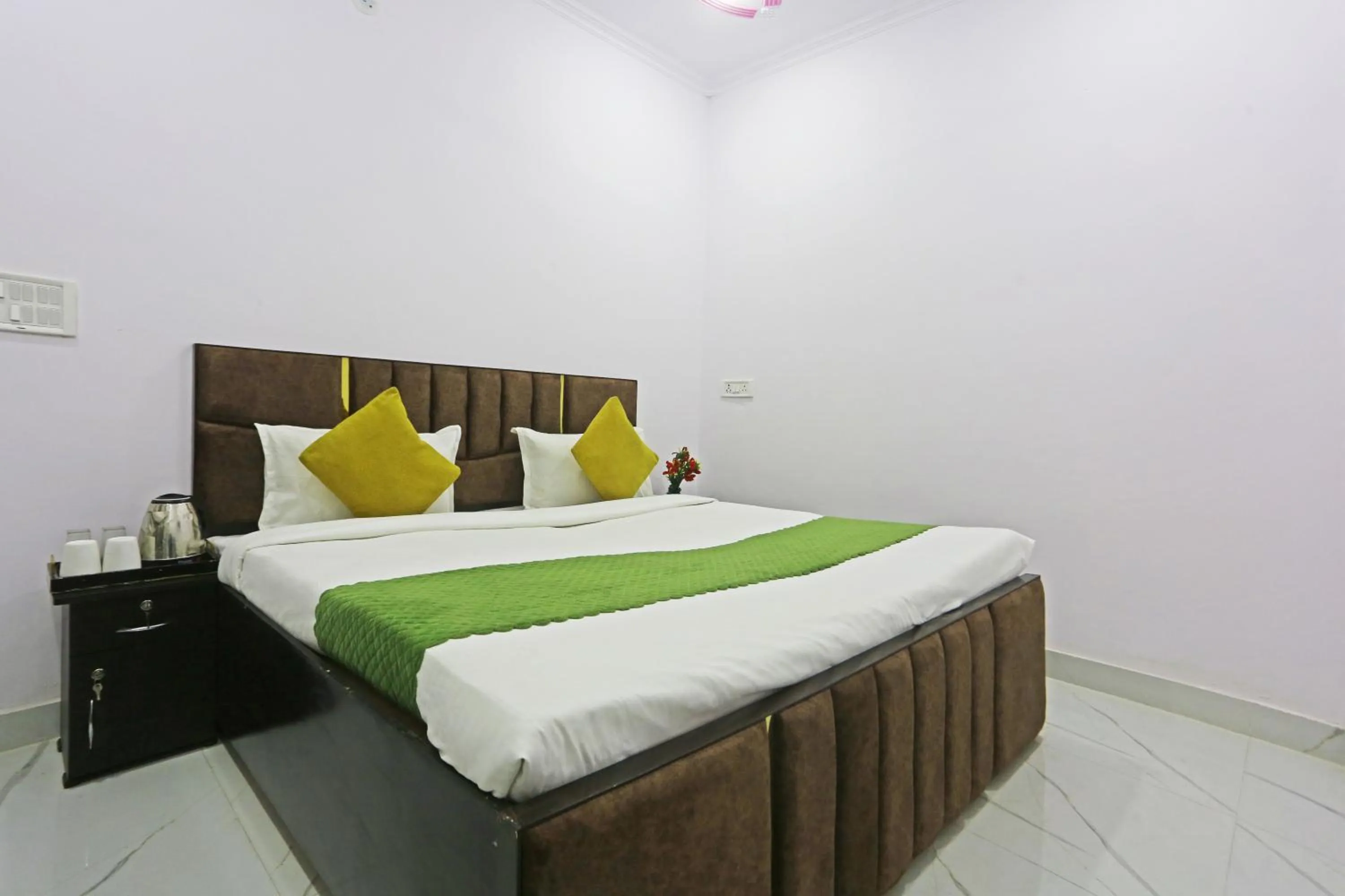 Bed in Twamev Residency