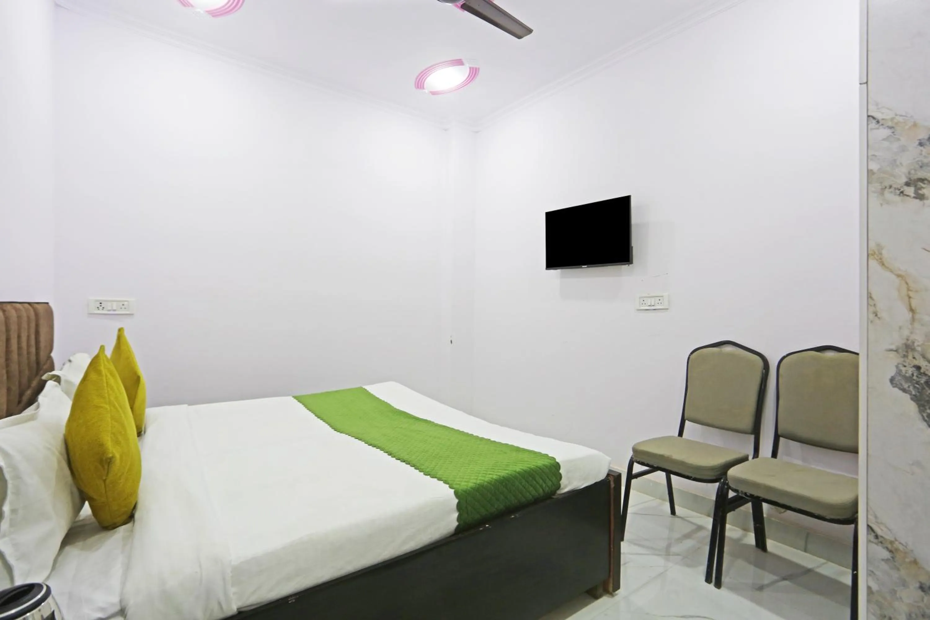 Bed in Twamev Residency