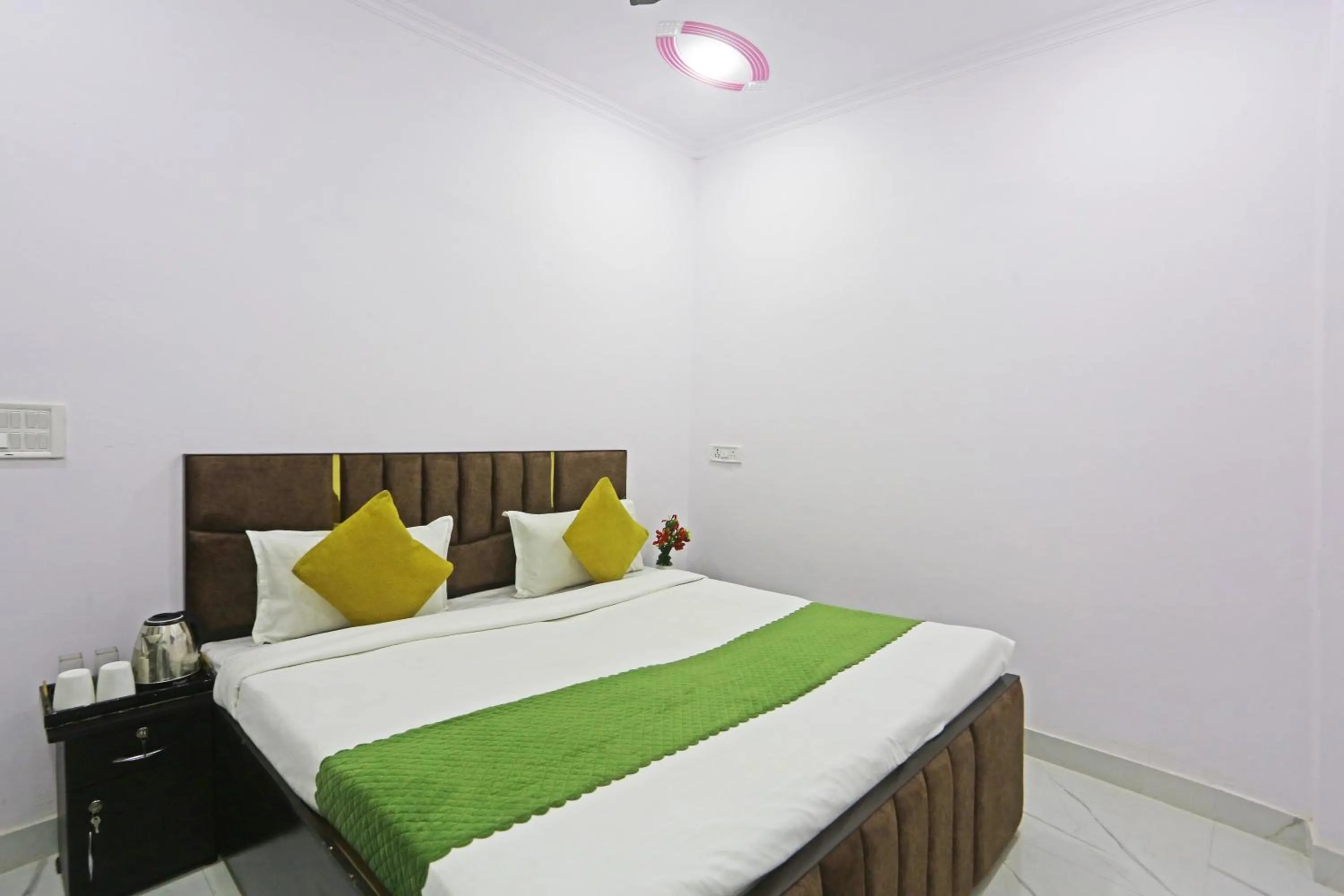 Bed in Twamev Residency