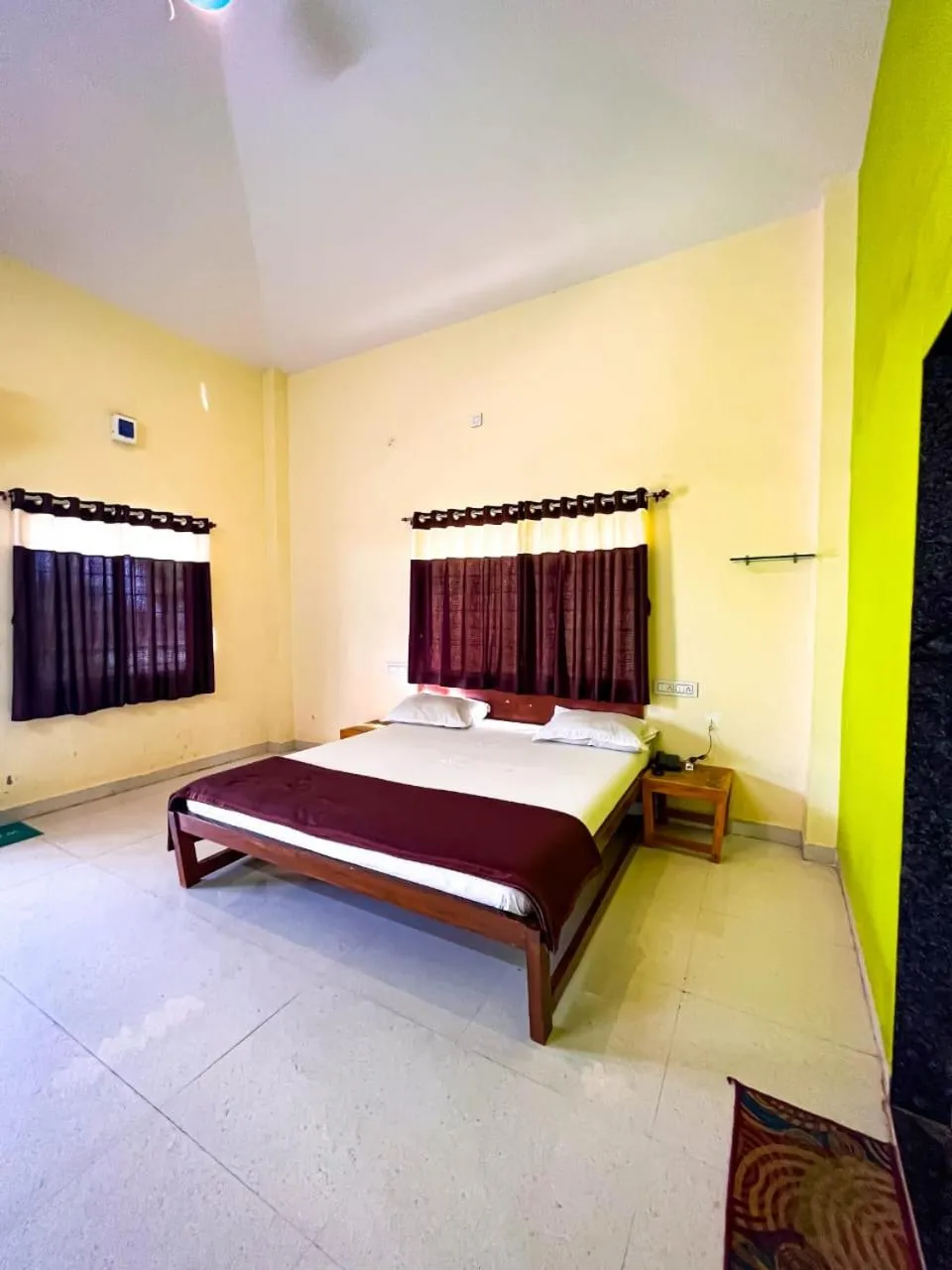 Bed in Madhura Agro Tourism