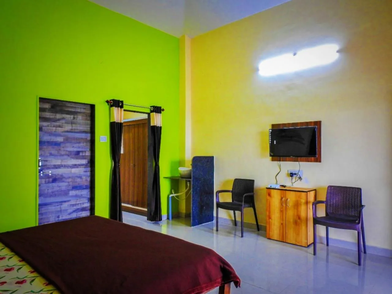 Bed in Madhura Agro Tourism