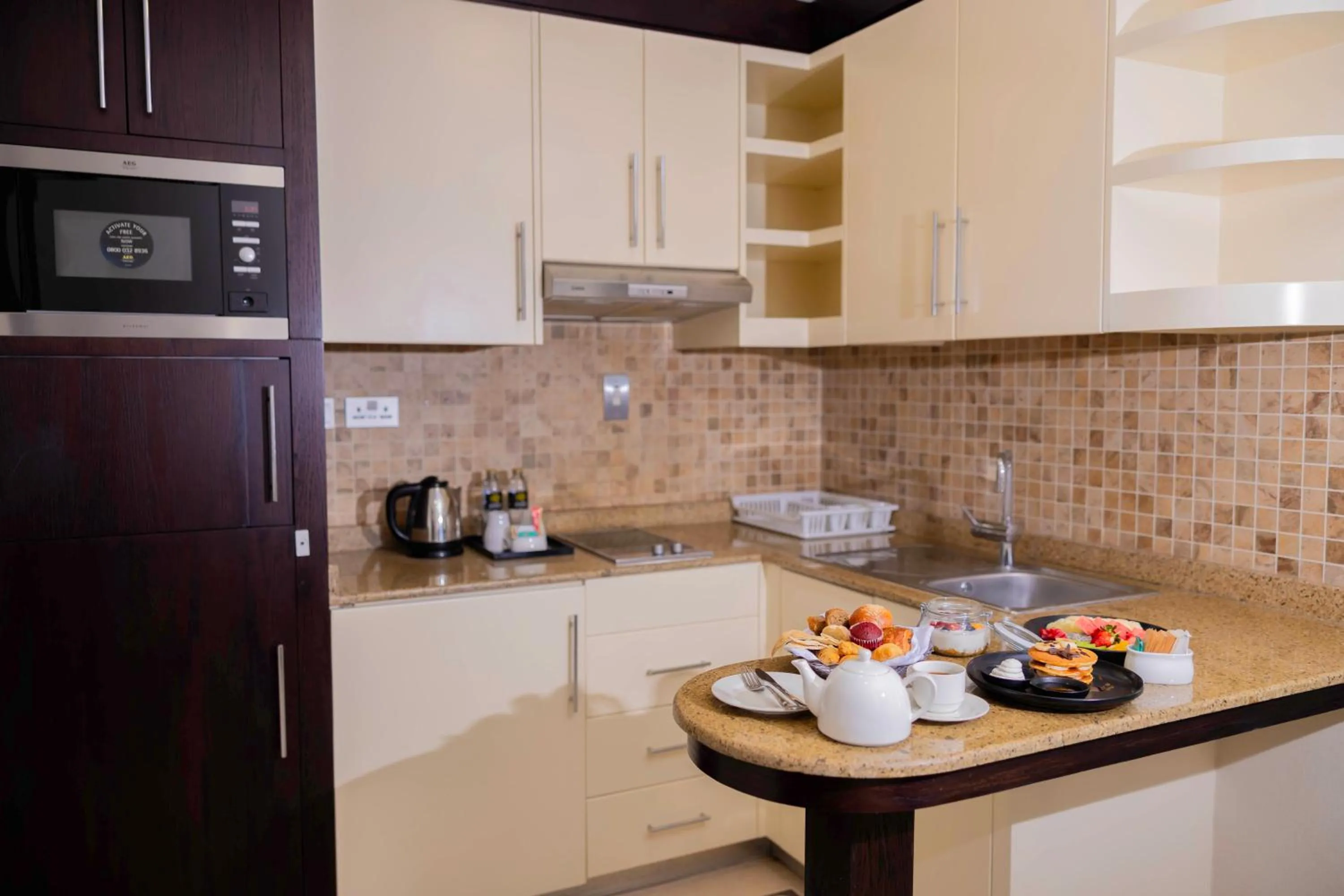 Kitchen or kitchenette in Jannah Executive Hotel Apartments
