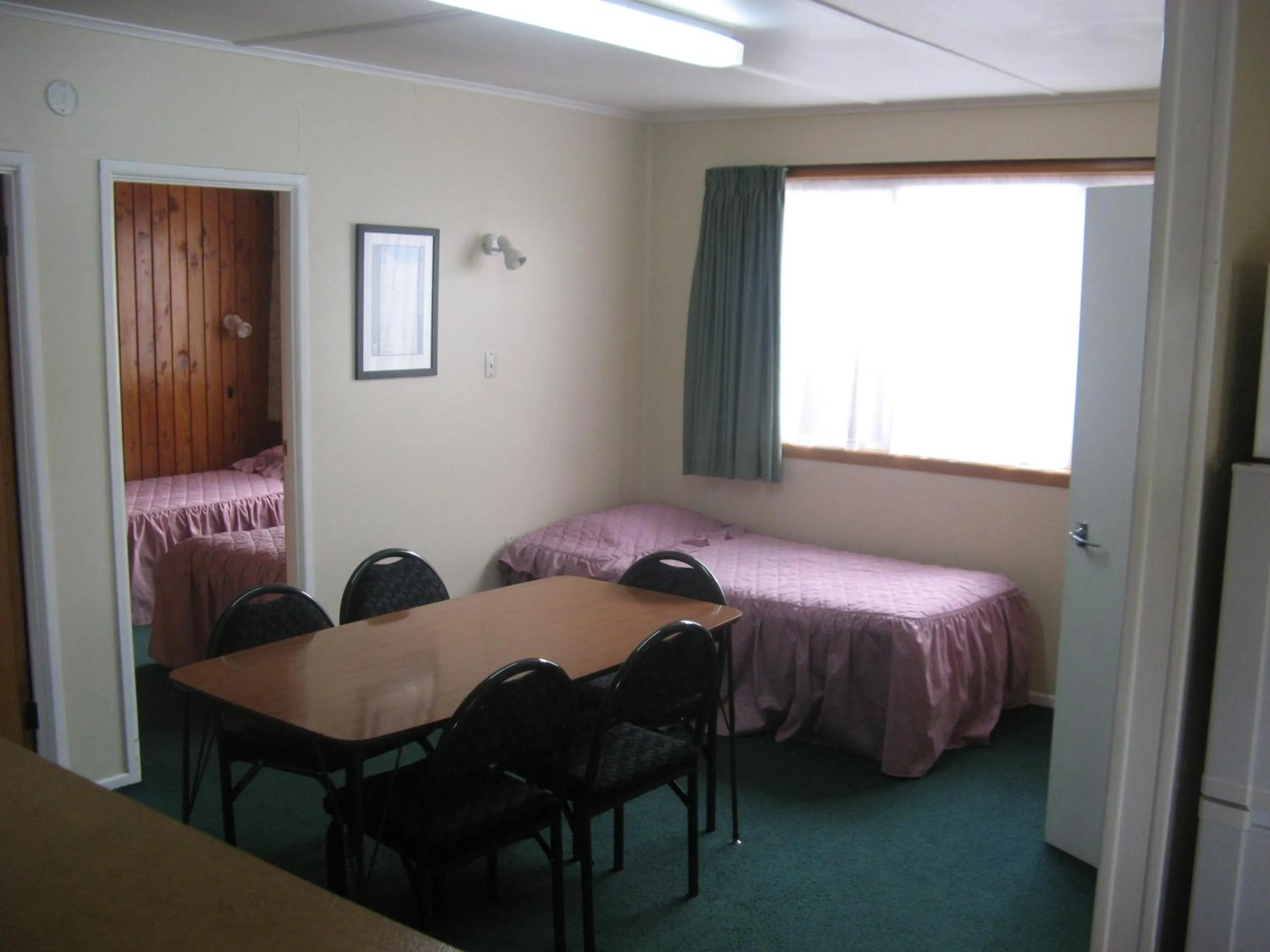 Bed in Tongariro River Motel