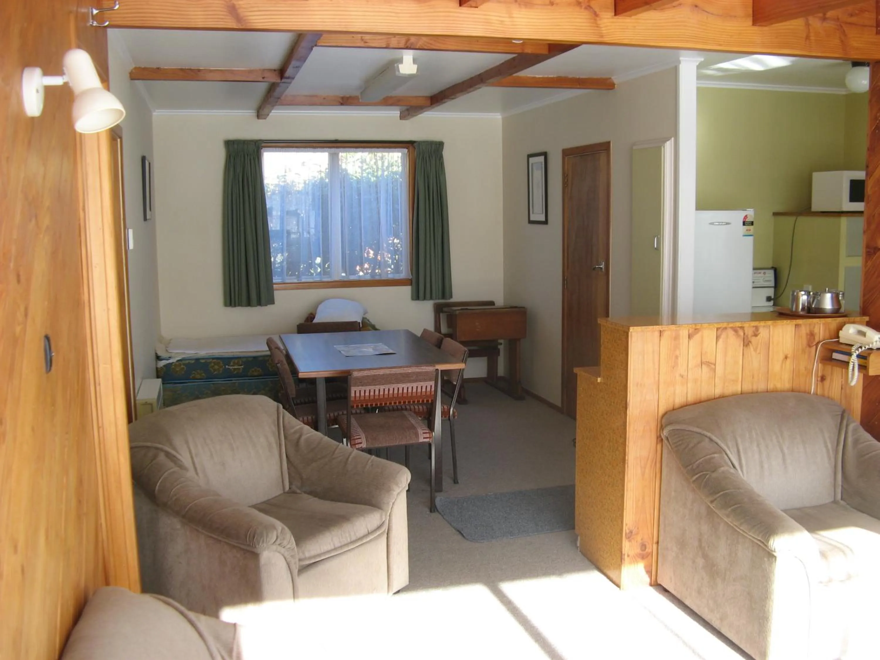 Kitchen or kitchenette in Tongariro River Motel