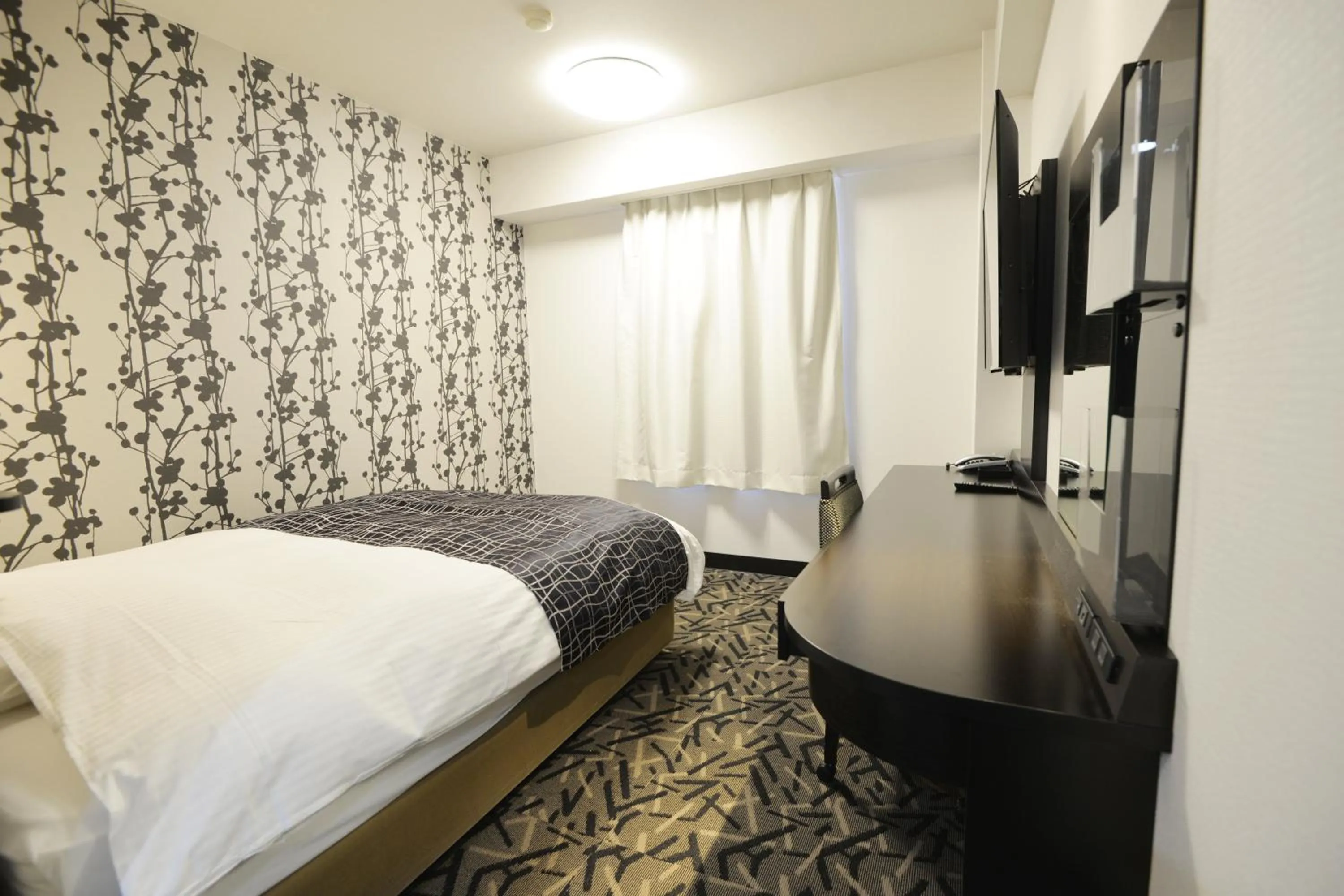 Bed in APA Hotel Mie Kameyama